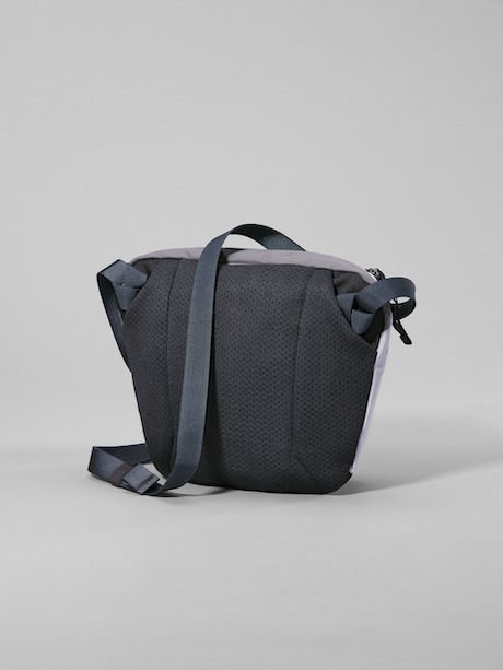 Photos of BEAMS & Arc'teryx's November 2023 collab clothing & bags in grey, black, and white patchwork