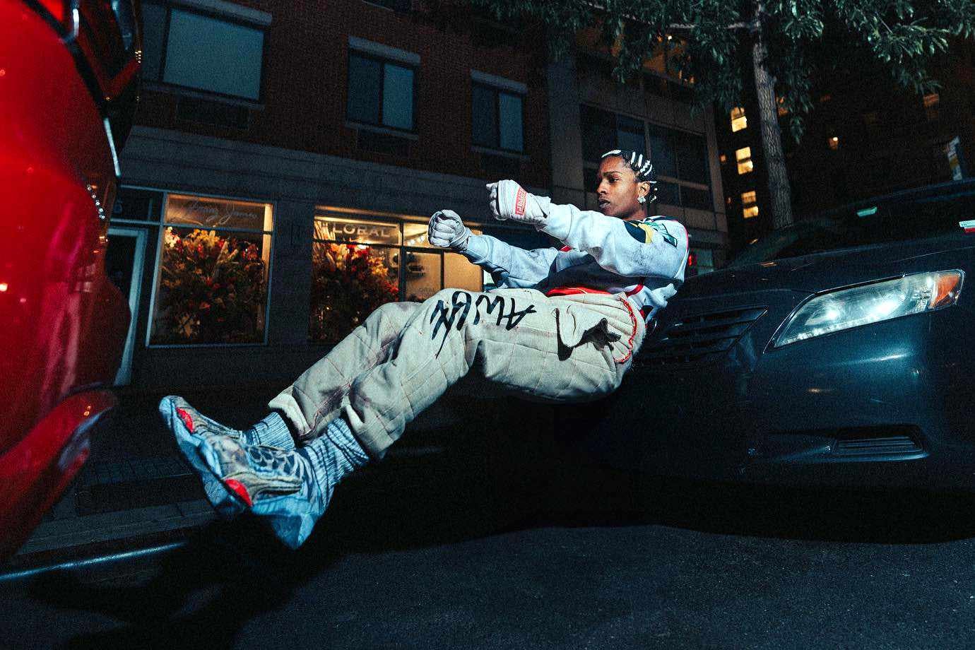 A$AP Rocky wears his PUMA F1 collab clothing