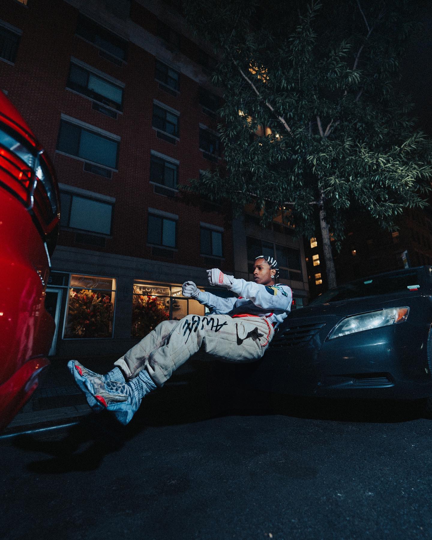 A$AP Rocky wears his PUMA F1 collab clothing