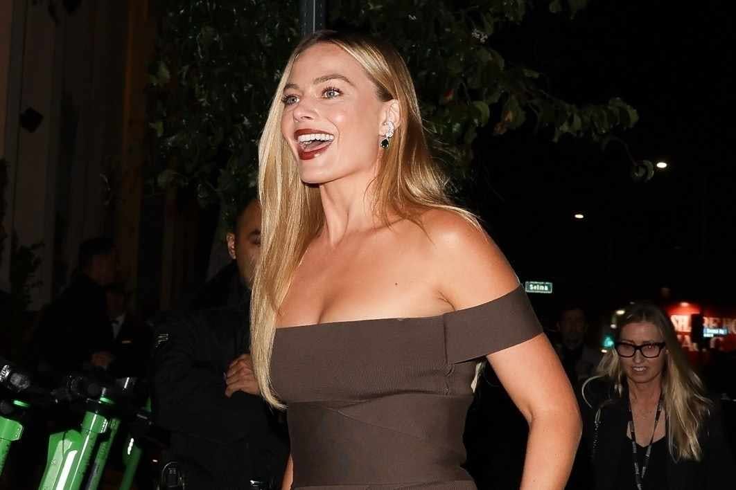 Margot Robbie wears a brown Fendi dress on the Variety red carpet