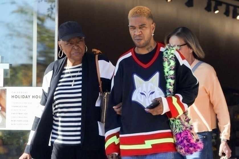 Kid Cudi seen outside Erewhon wearing his Members of the Rage fox jersey & cargo denim jeans