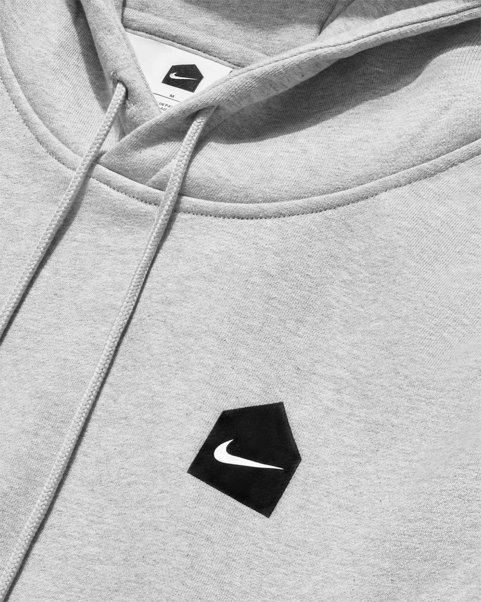 Nike & Dover Street Market's fleece sweats collab in grey, black, and navy