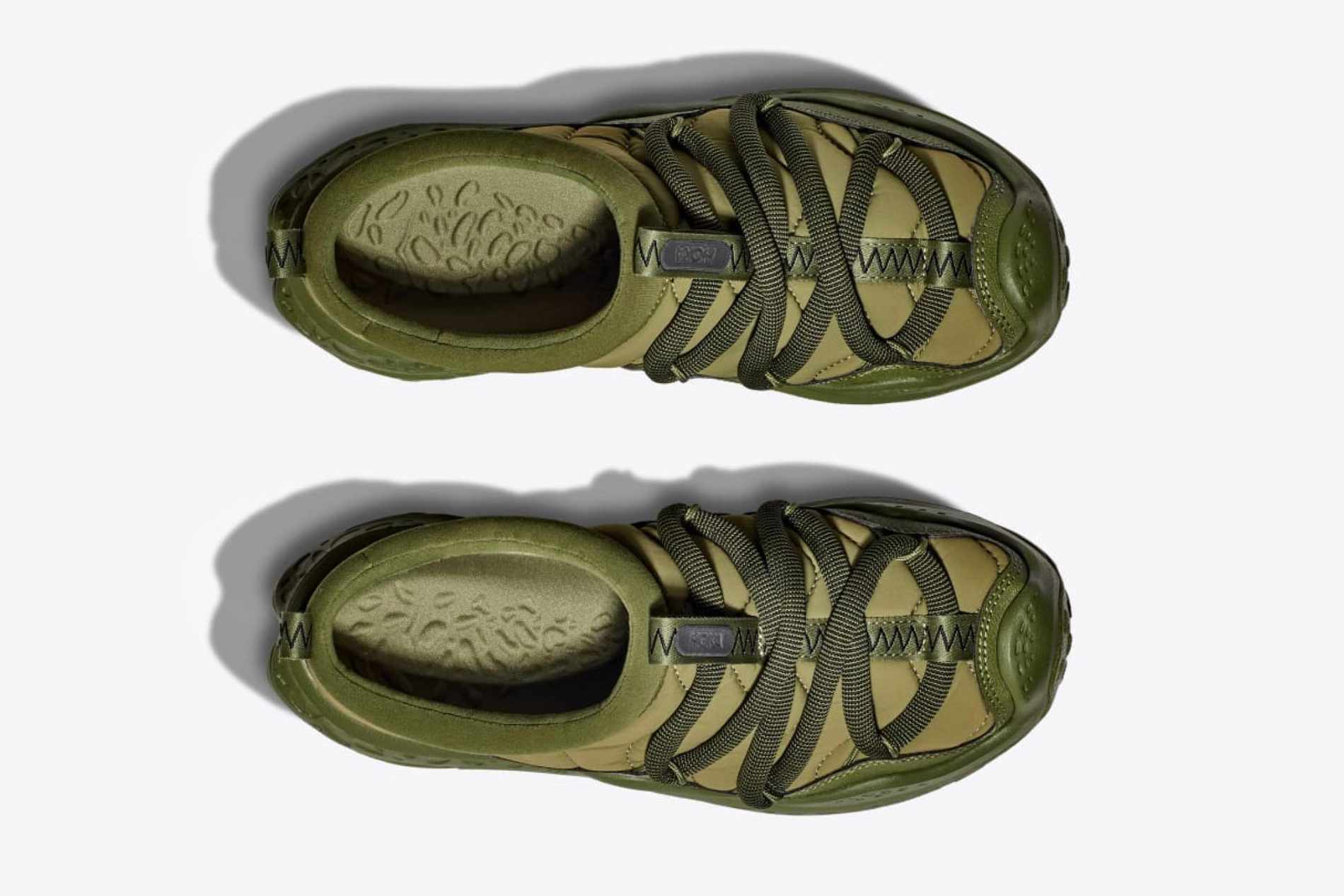 Top-down photo of HOKA's Ora Primo mule in a green colorway with thick brown laces