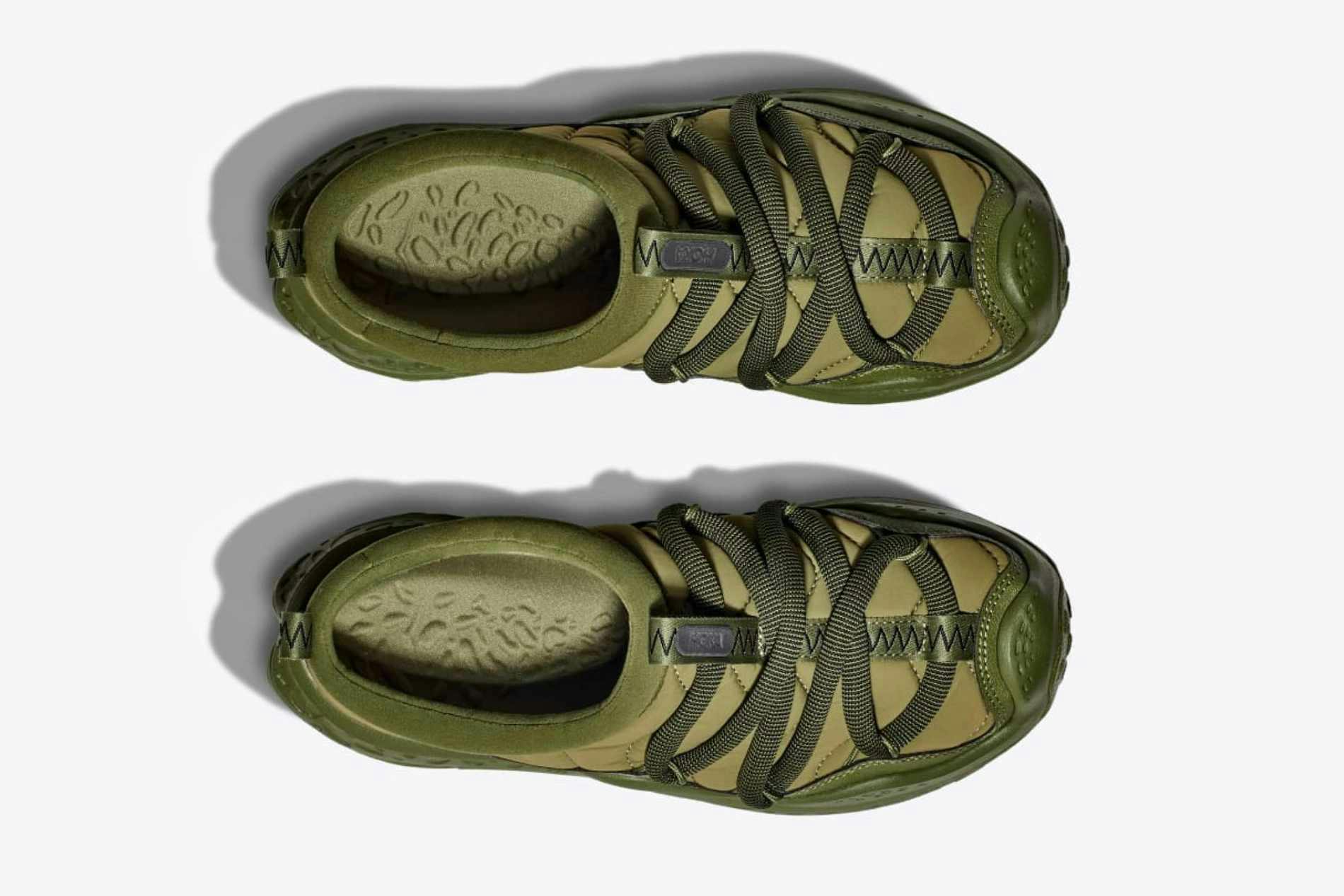 Top-down photo of HOKA's Ora Primo mule in a green colorway with thick brown laces