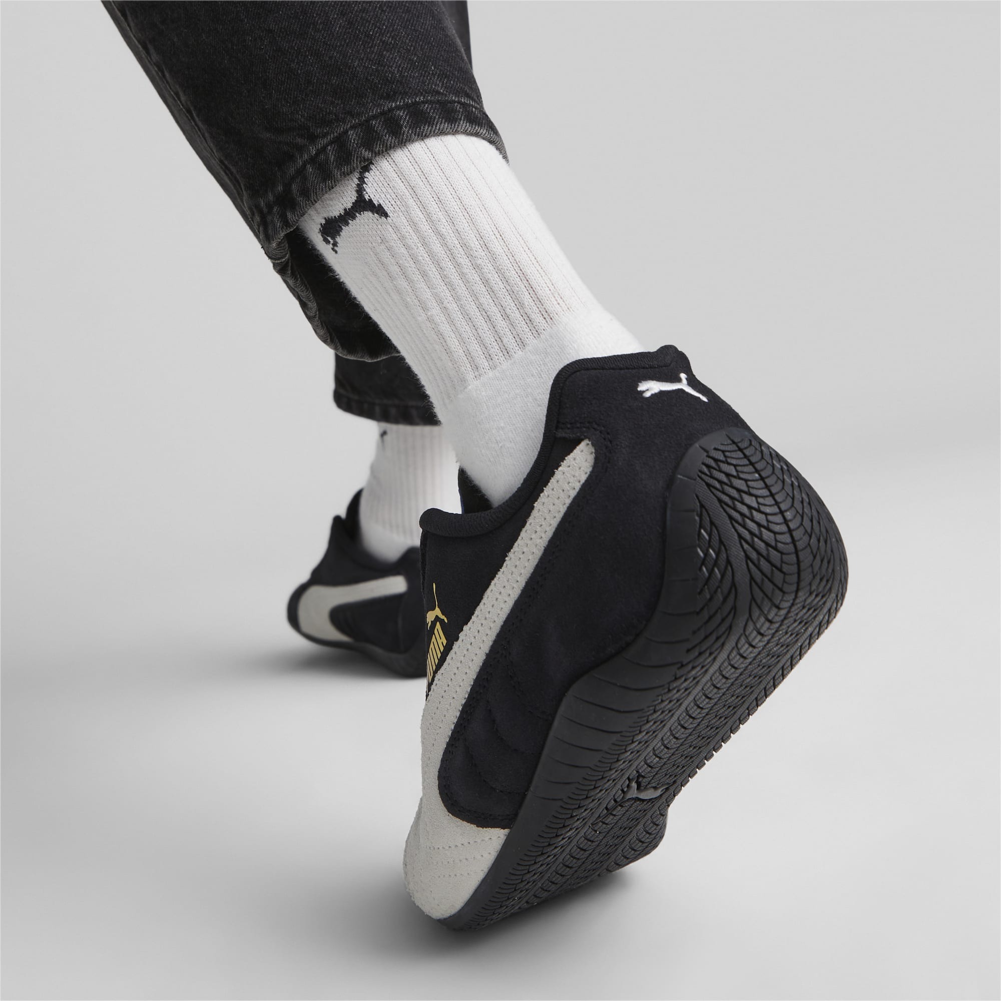 PUMA's Speedcat sneaker in a black and white colorway
