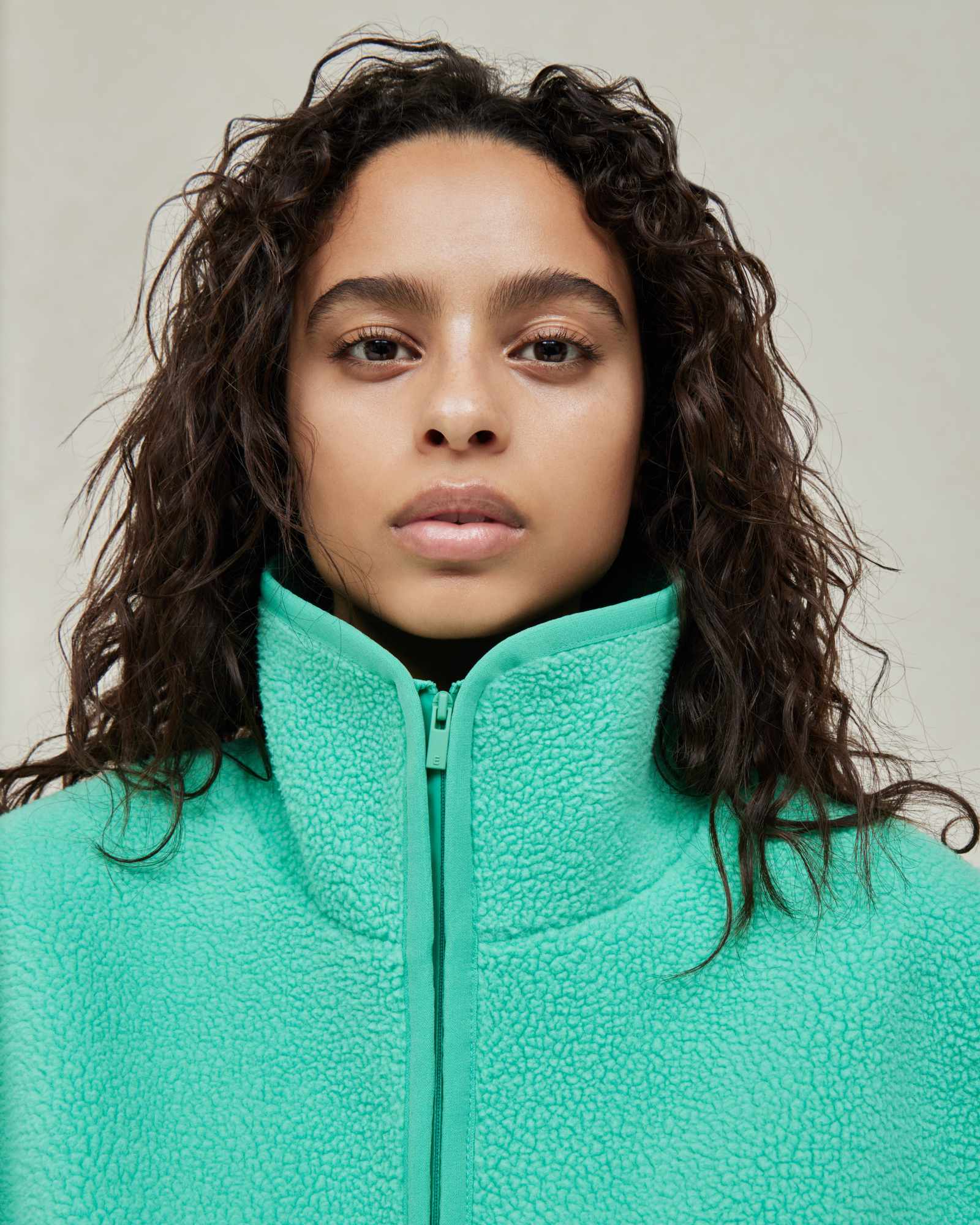 Models wear Fear of God ESSENTIALS' Winter 2023 hoodies, sweatshirts, t-shirts, and sweatpants