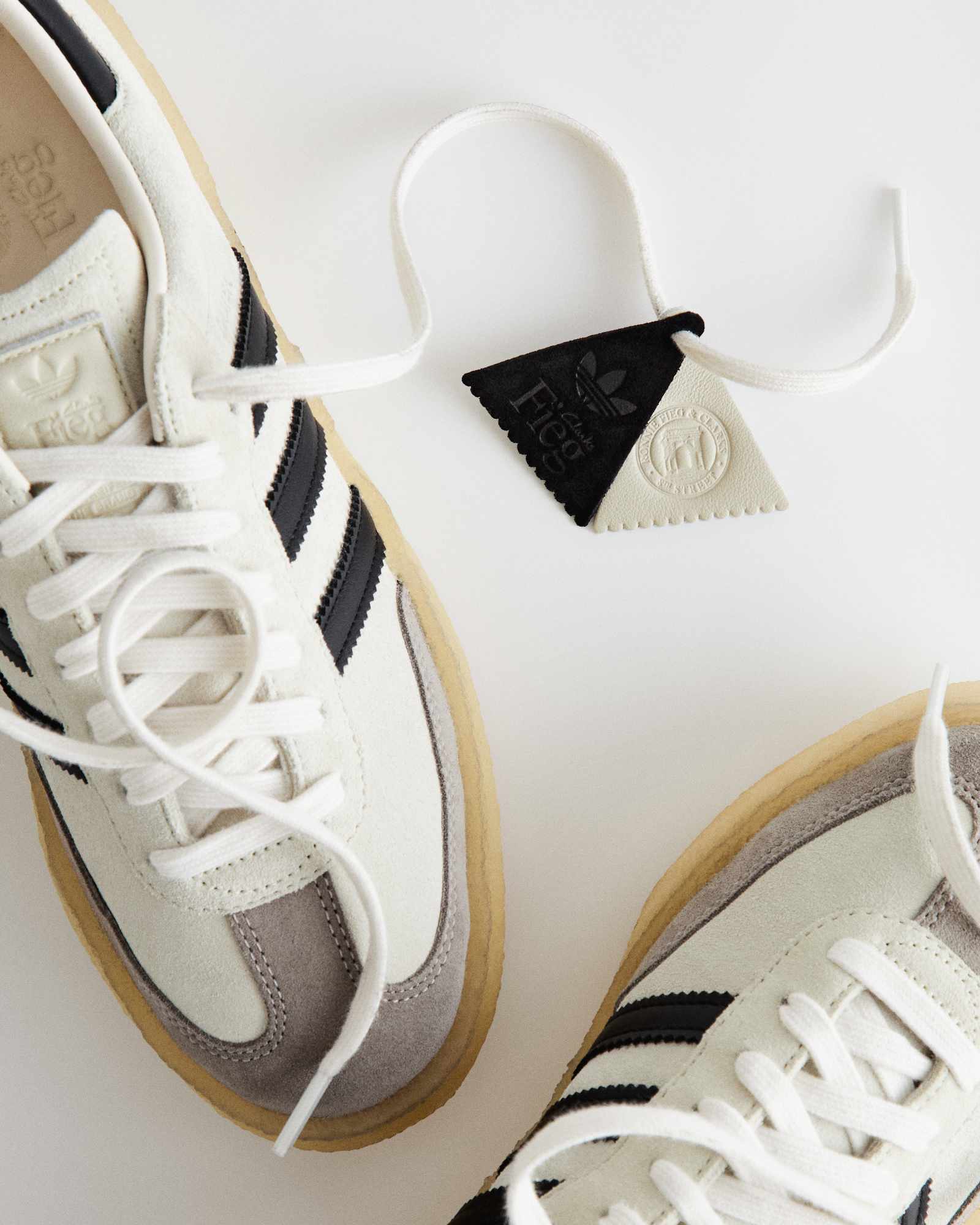 KITH x Clarks x adidas Samba sneakers in a black and white colorway