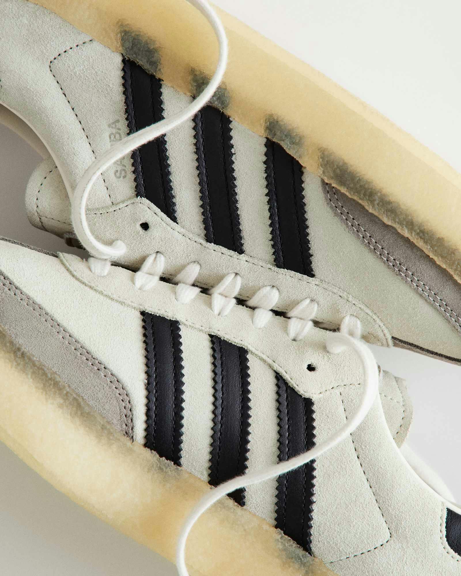 KITH x Clarks x adidas Samba sneakers in a black and white colorway