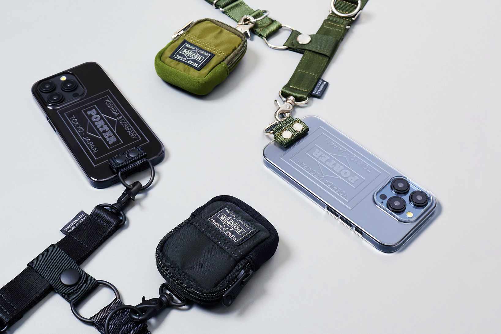 Yoshida Porter's phone sling in black and green