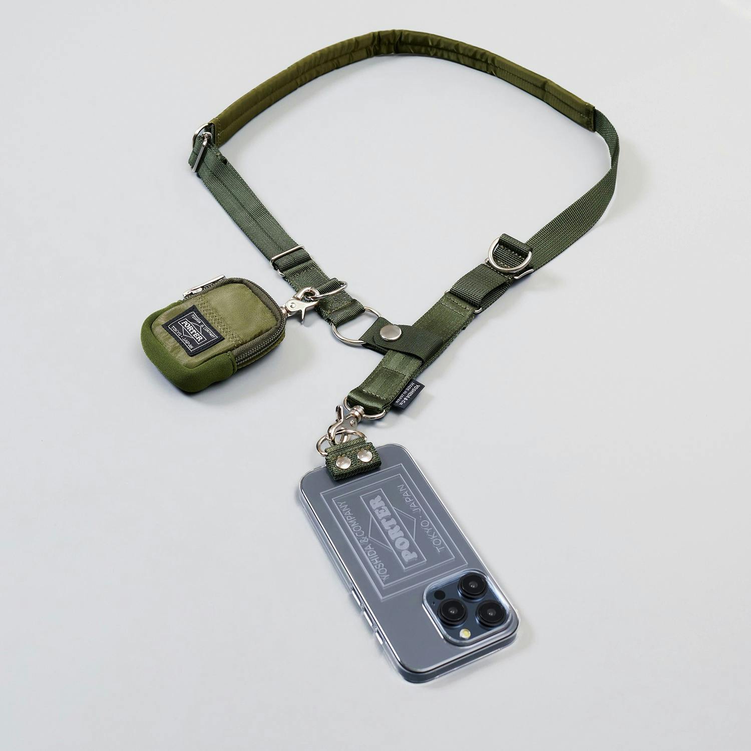 Yoshida Porter's phone sling in black and green