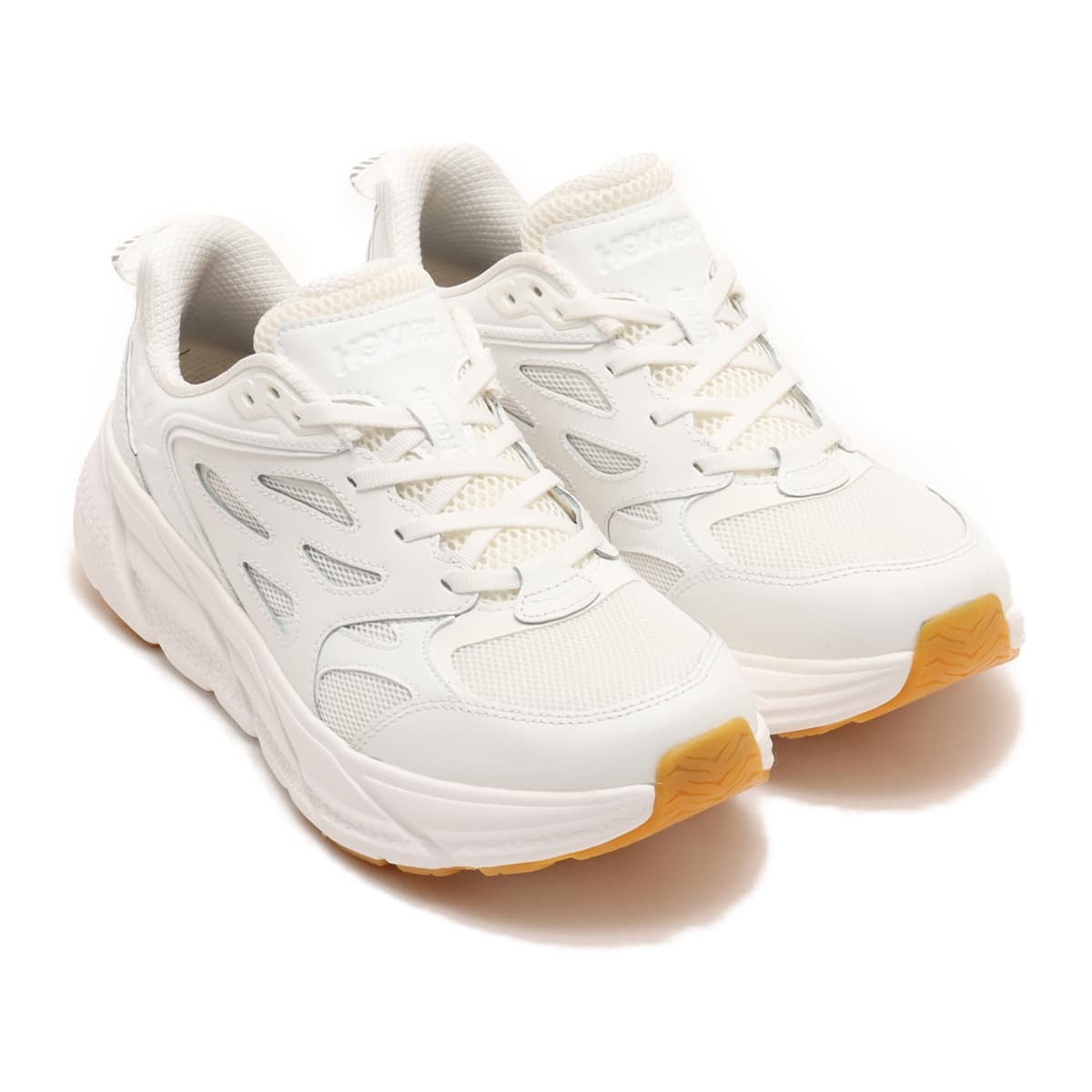 HOKA ONE ONE's Clifton Athletics sneaker in white and black leather colorways