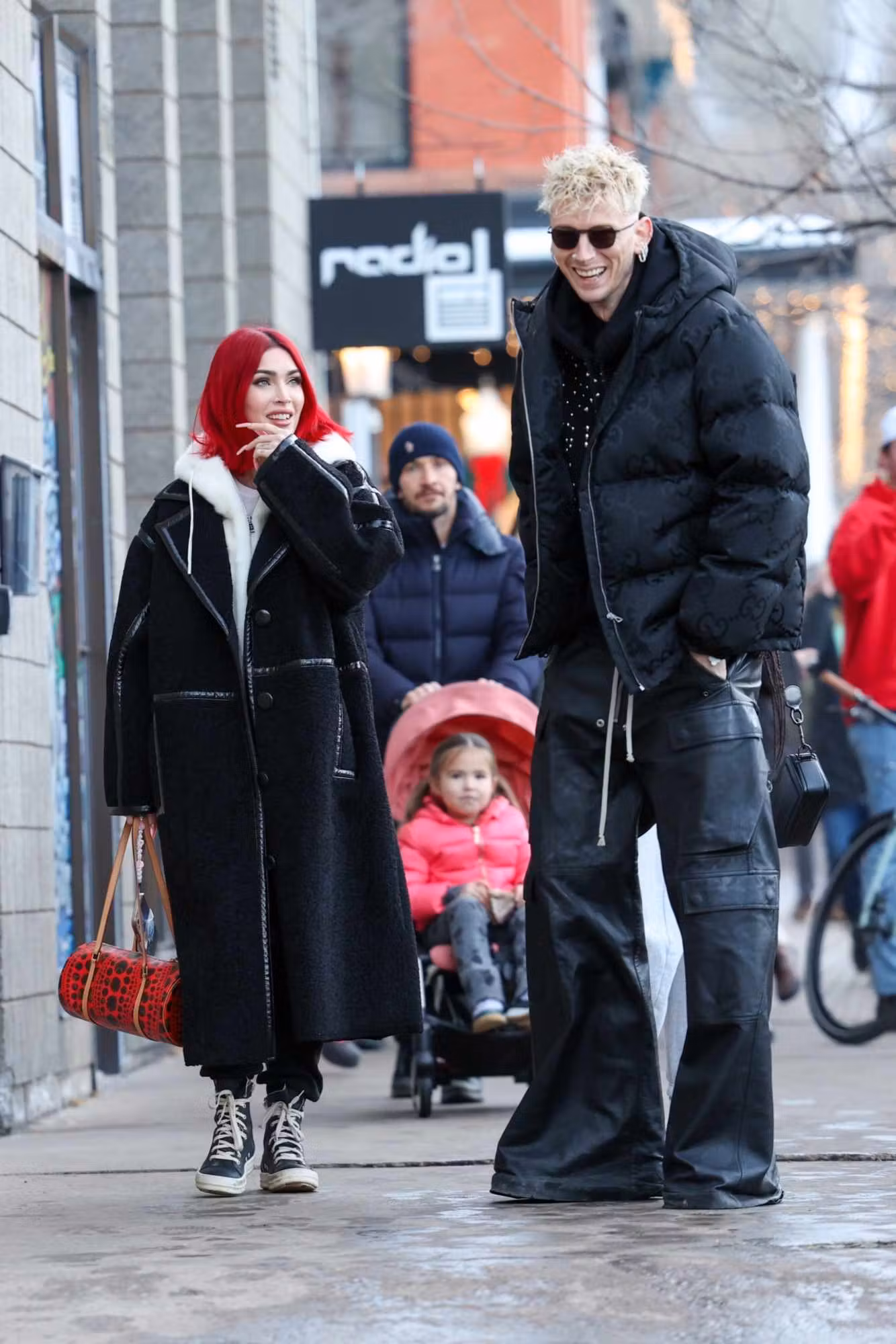 Megan Fox & Machine Gun Kelly wear black Rick Owens outfits in Aspen