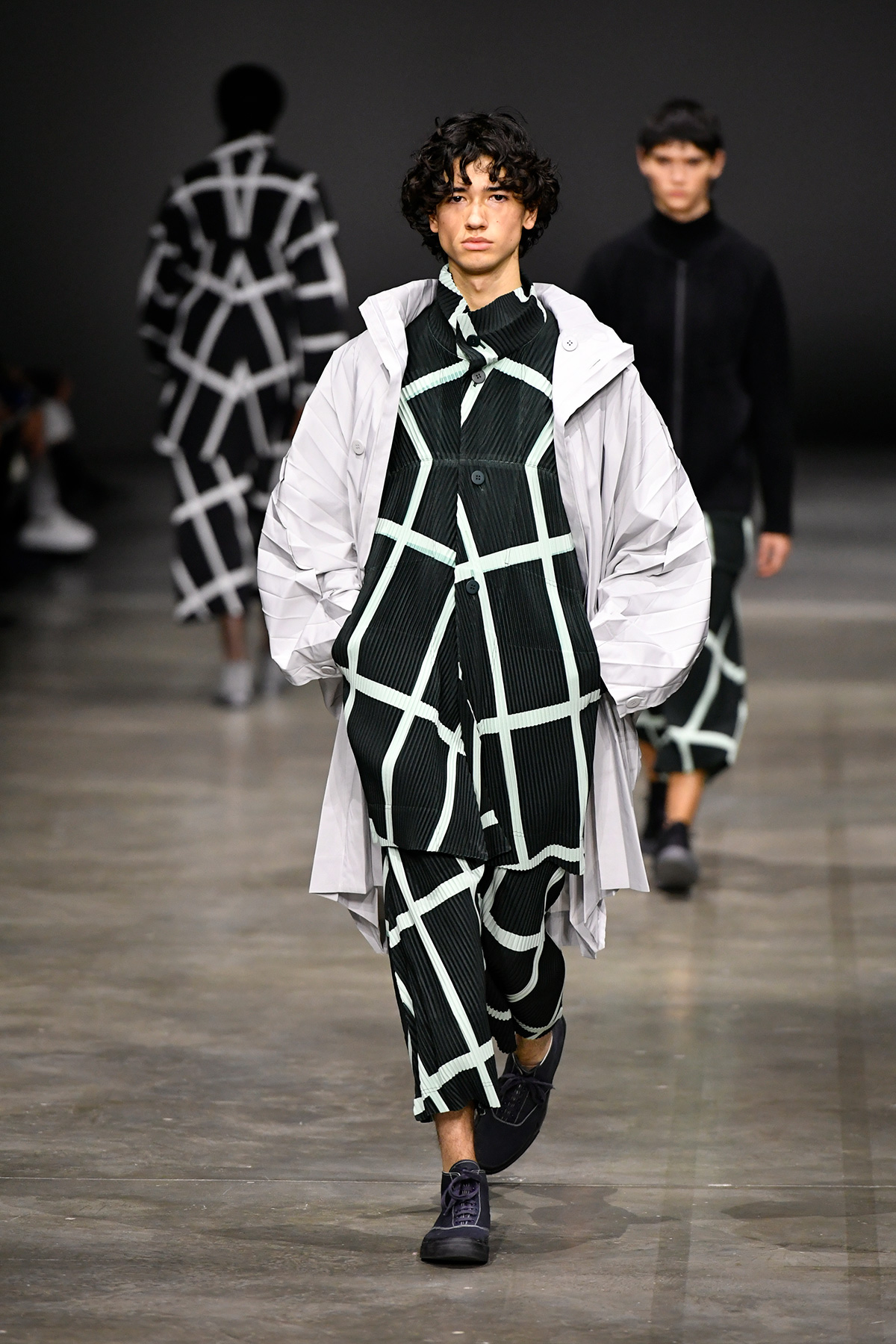 Runway at Homme Plissé Issey Miyake Mens Fall 2023 photographed on January 19, 2023 in Paris, France.