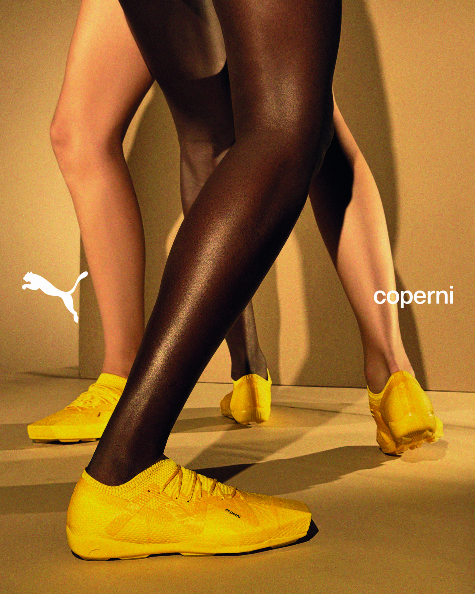 Models wear PUMA & Coperni's collaborative sneaker