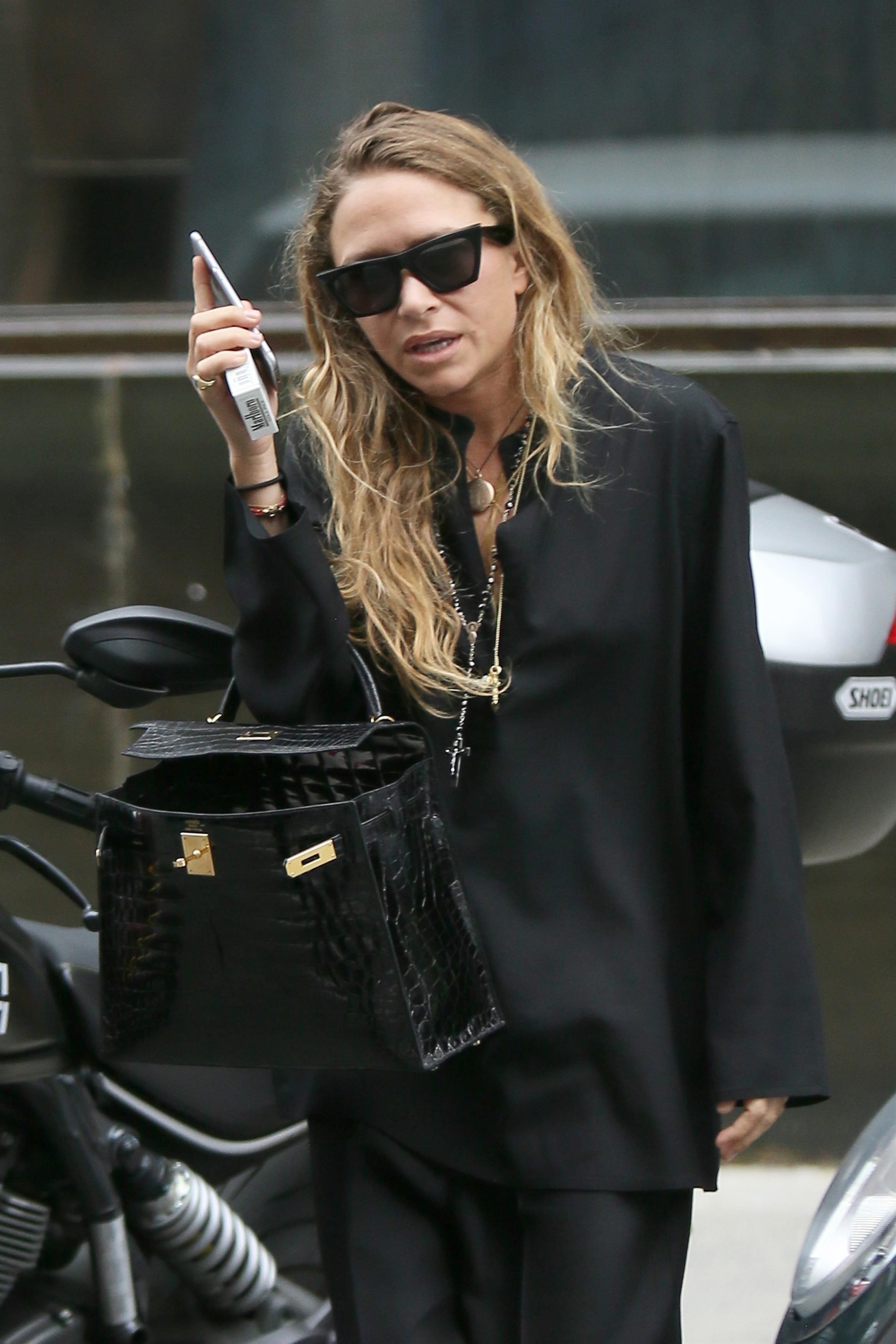 Mary-Kate Olsen leaving her West Village office with her exotic Kelly in New York on July 21, 2017.