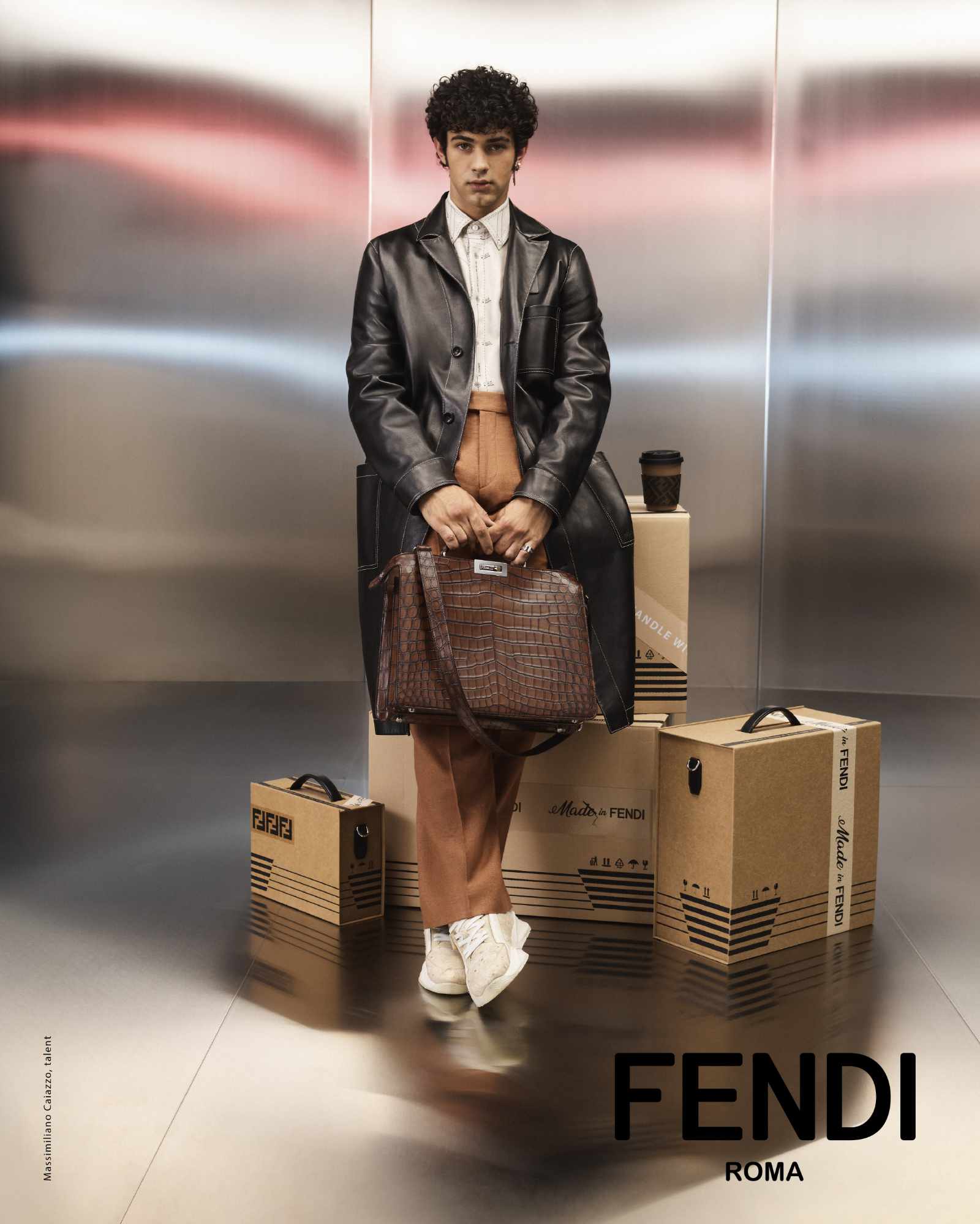 Models wear Fendi's SS24 menswear collection