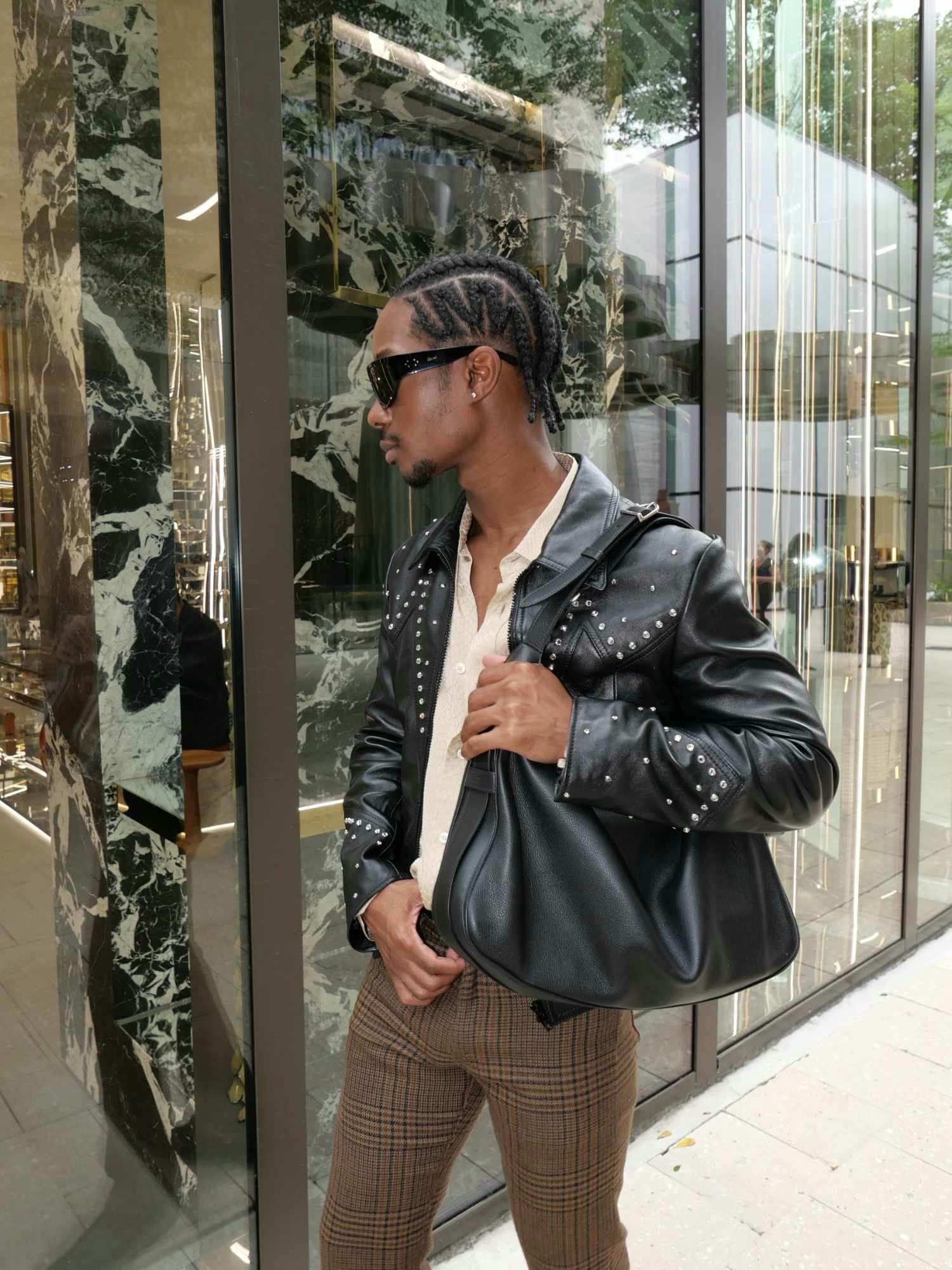 Lamar Johnson wearing CELINE in the CELINE Miami store