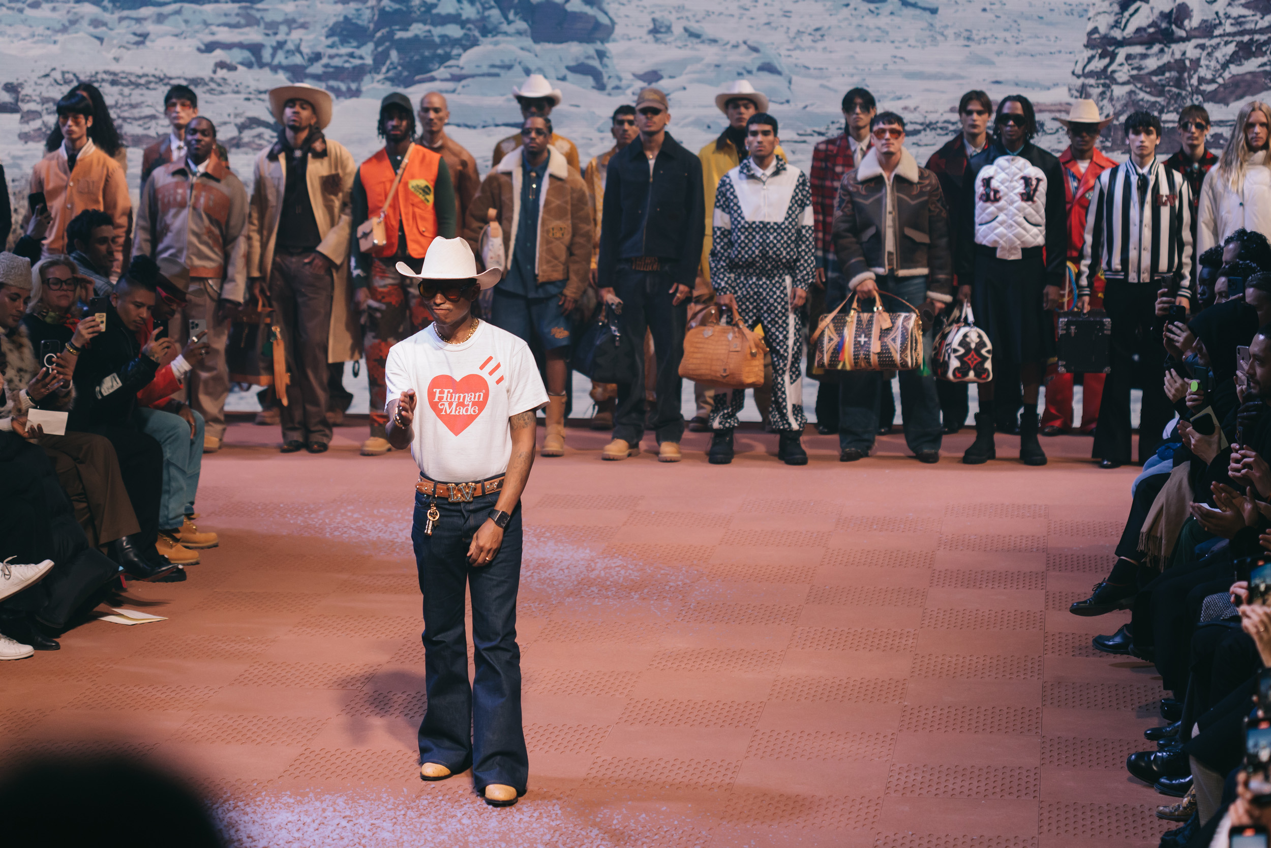 Models wear Pharrell's Louis Vuitton FW24 menswear collection