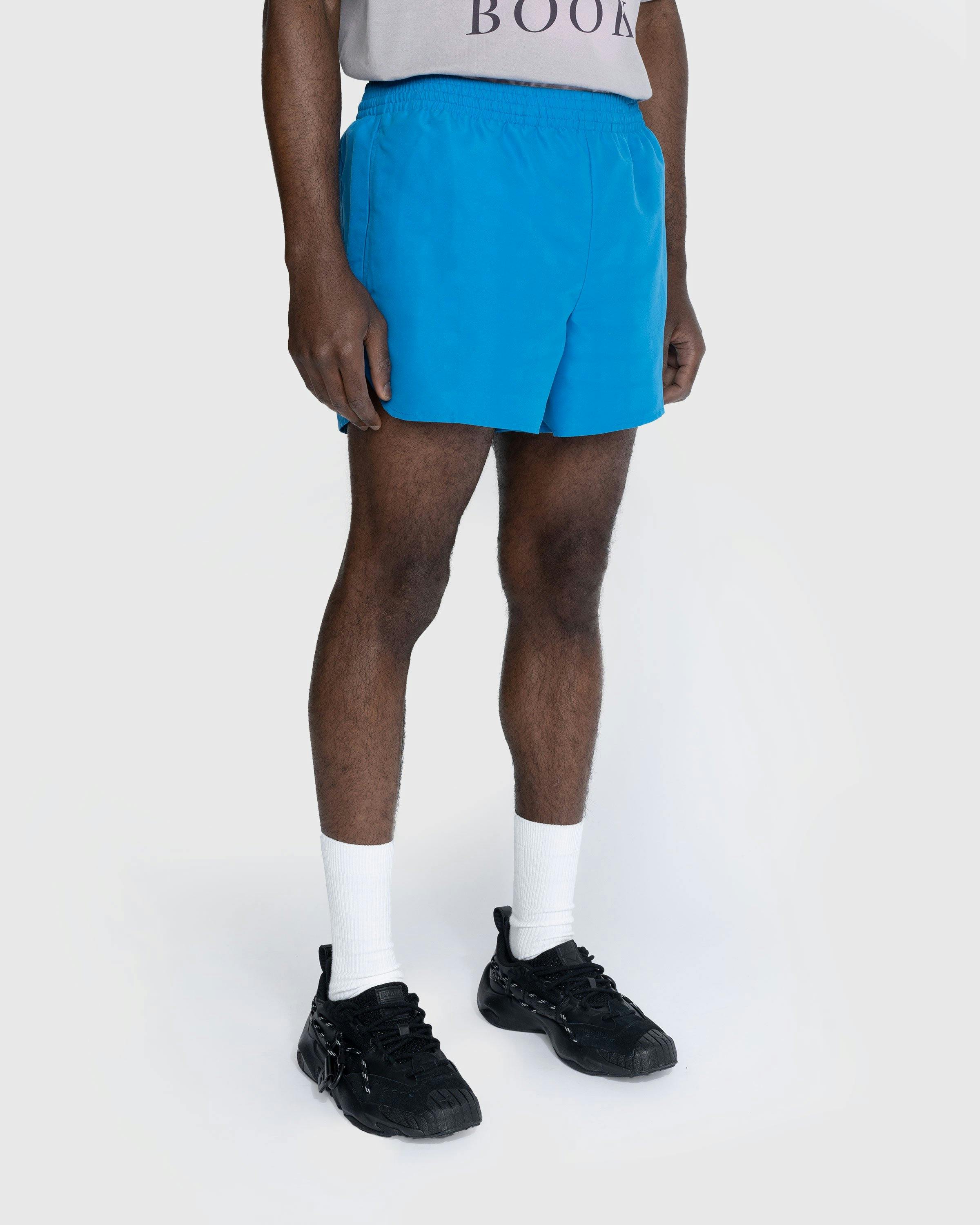 Acne Studios - Water Reactive Logo Swim Shorts Blue - Clothing - Blue - Image 4