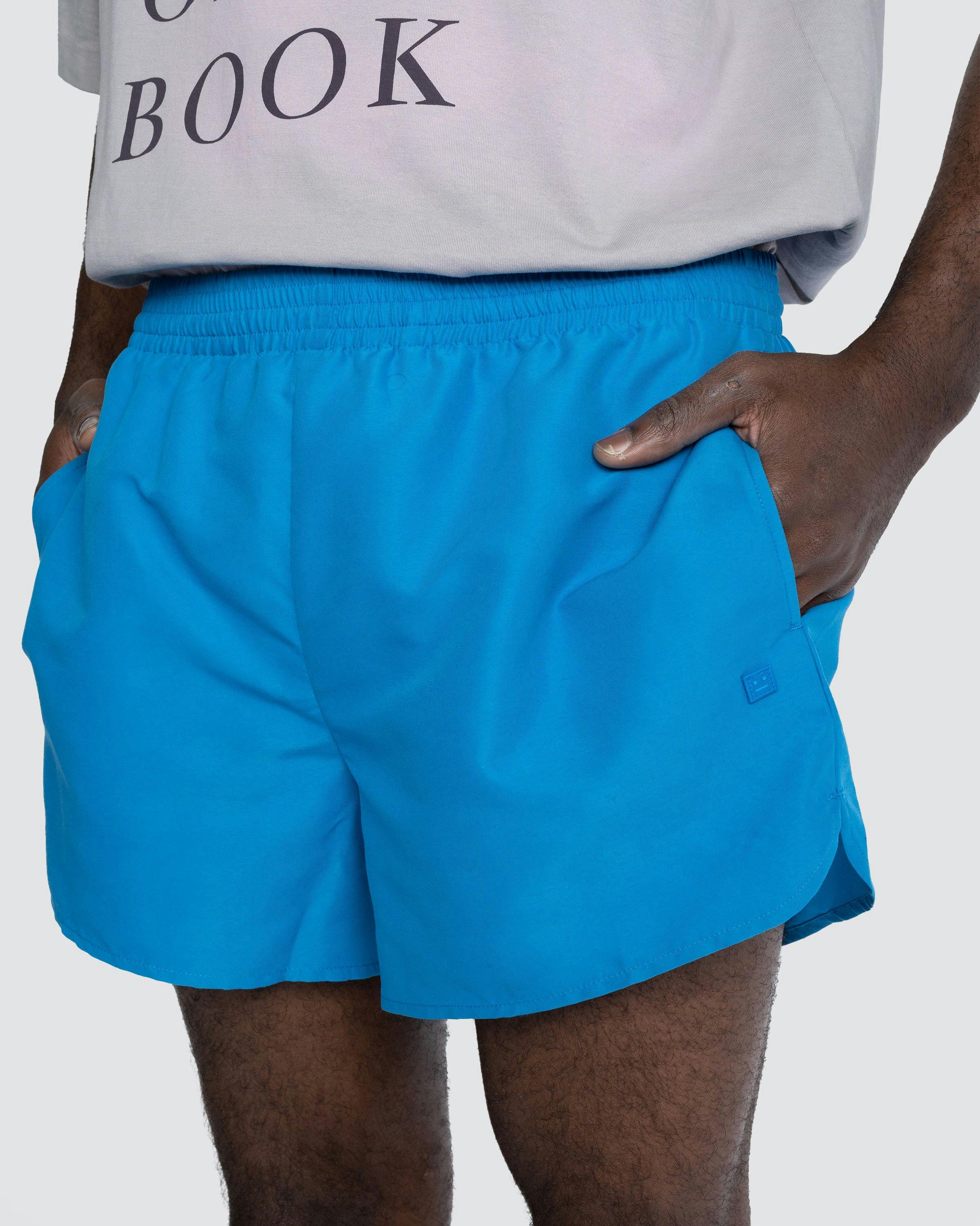 Acne Studios - Water Reactive Logo Swim Shorts Blue - Clothing - Blue - Image 5