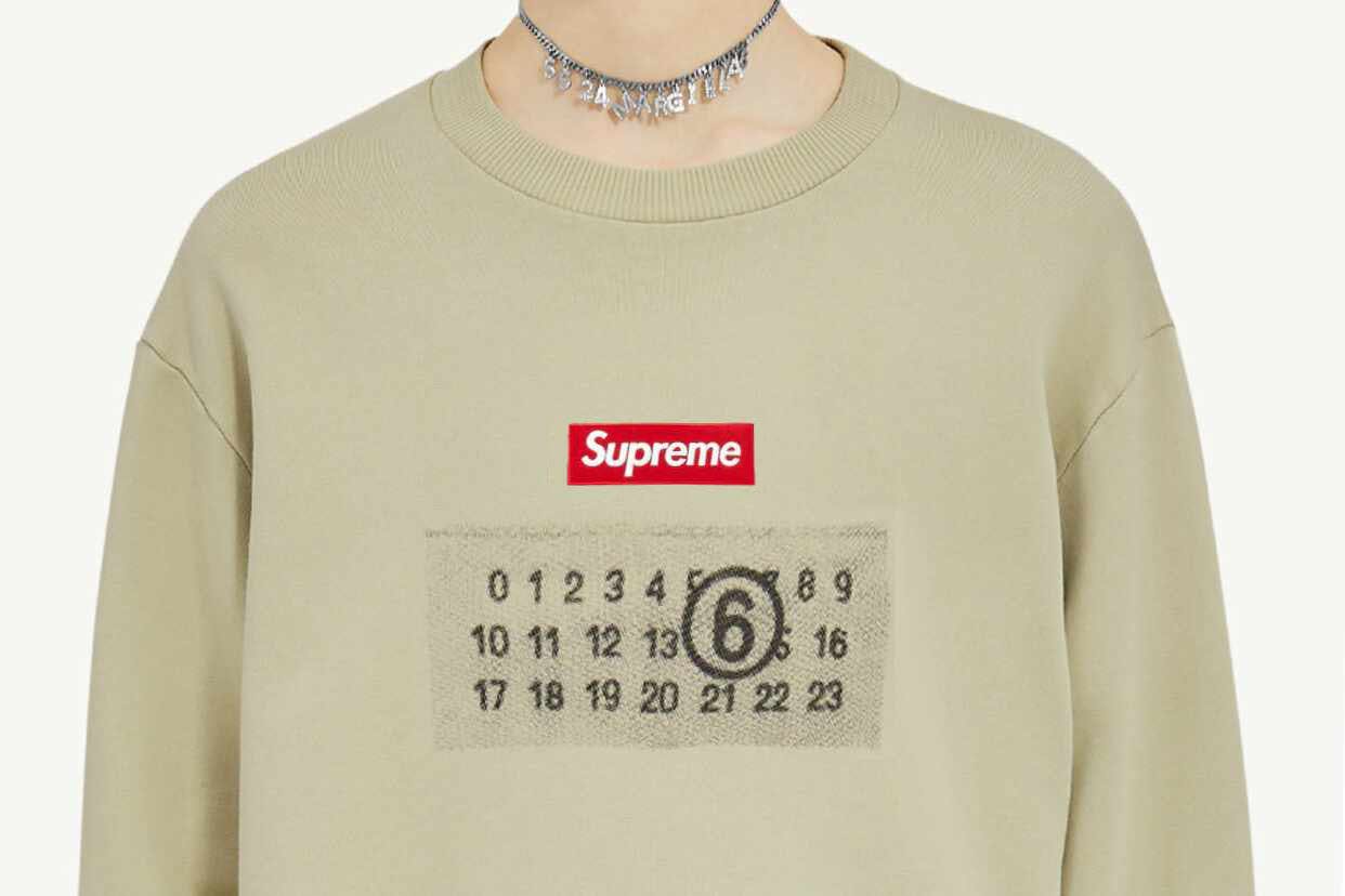 An MM6 Maison Margiela sweater with a Supreme logo