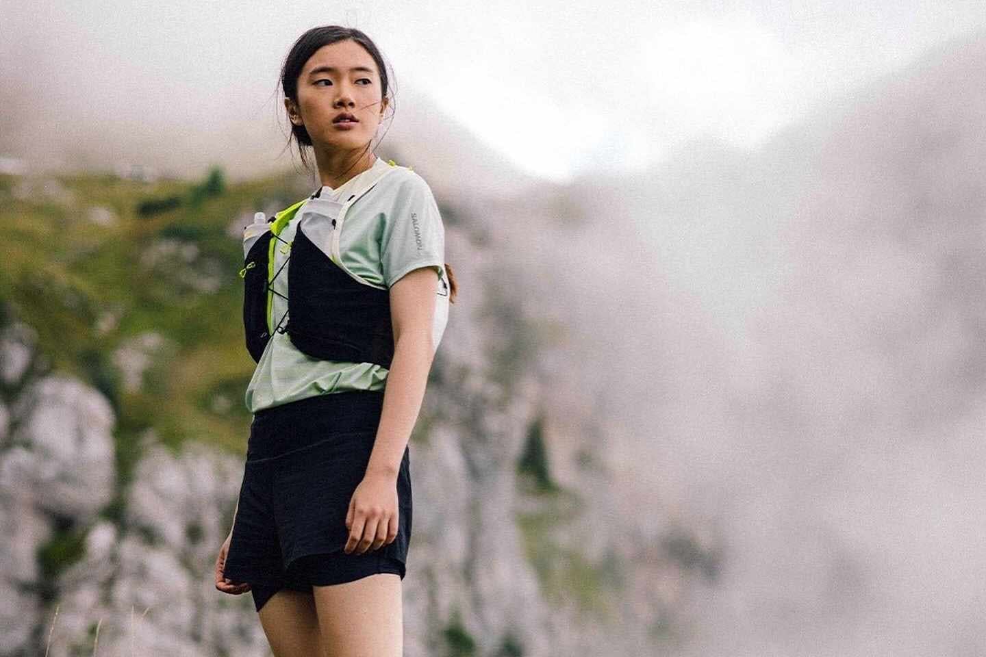 A model wears Salomon's running vest & XT-6 sneakers