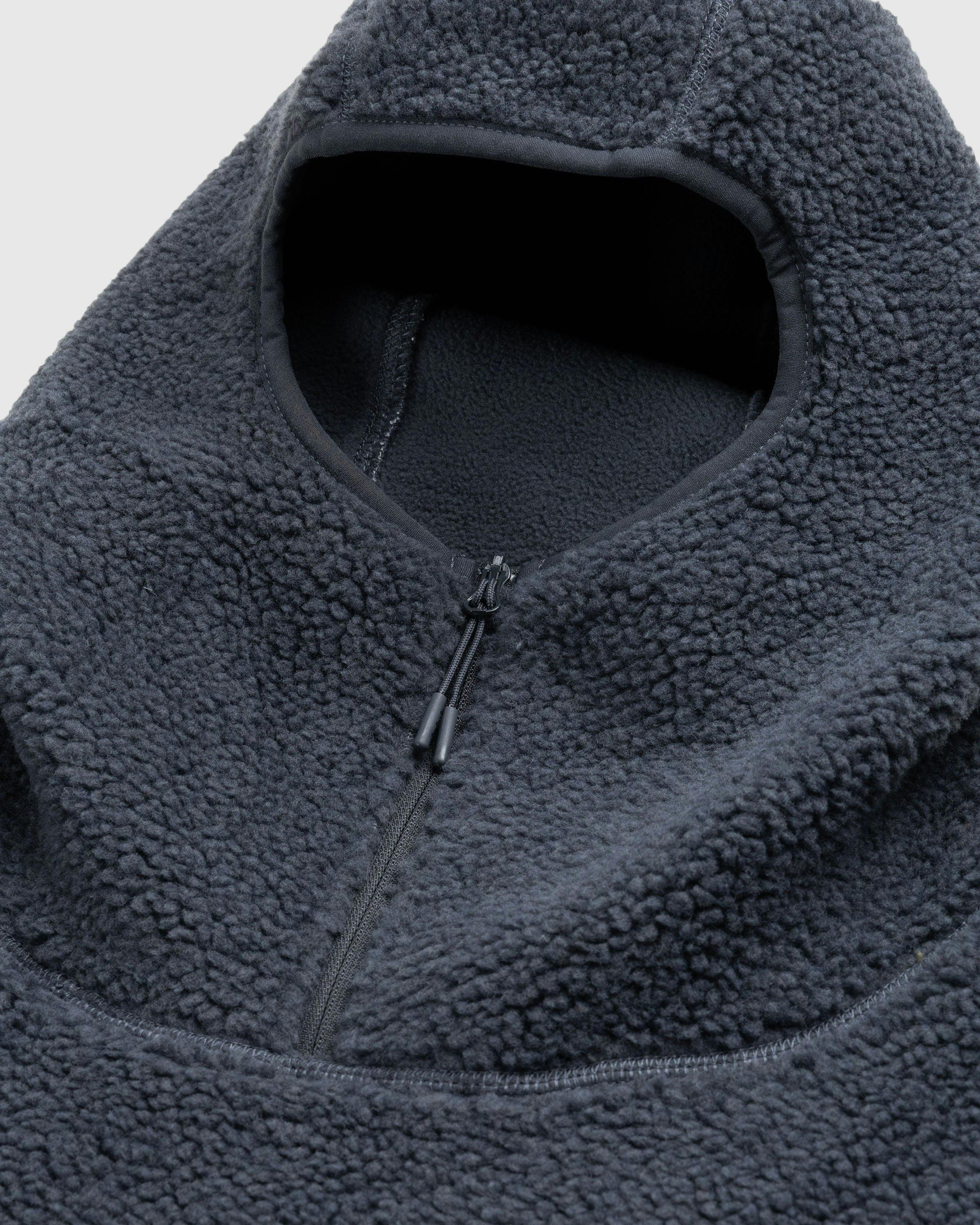 https://www.highsnobiety.com/static-assets/dato/1708455729-entire-studios-fluffy-fleece-v2-charcoal-image-5.jpeg