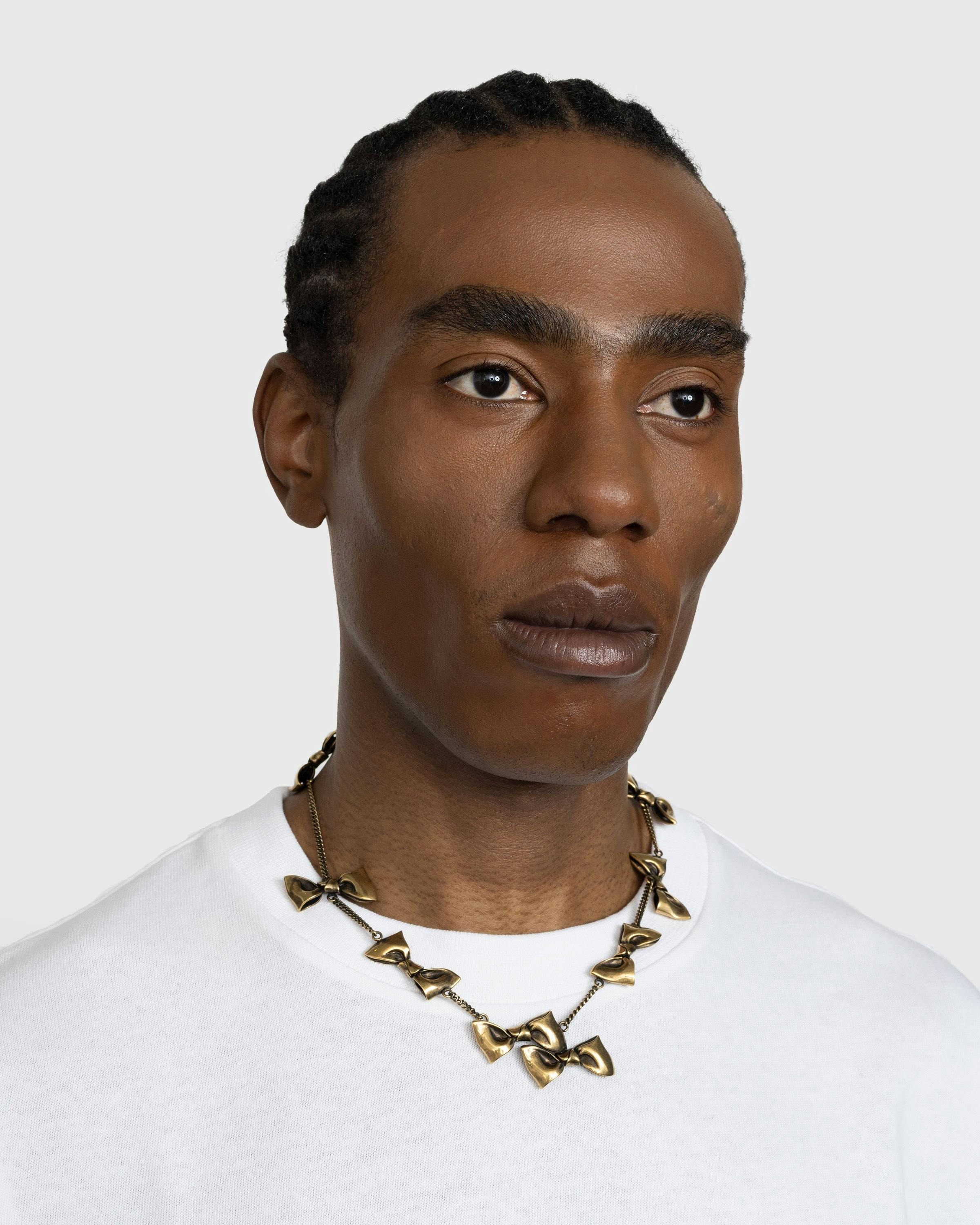 Acne Studios Bow Necklace Gold Highsnobiety Shop