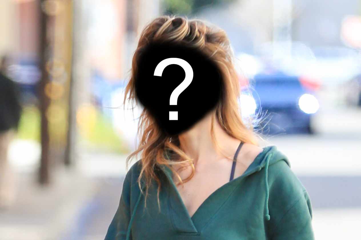 A woman with blonder hair, faced hidden