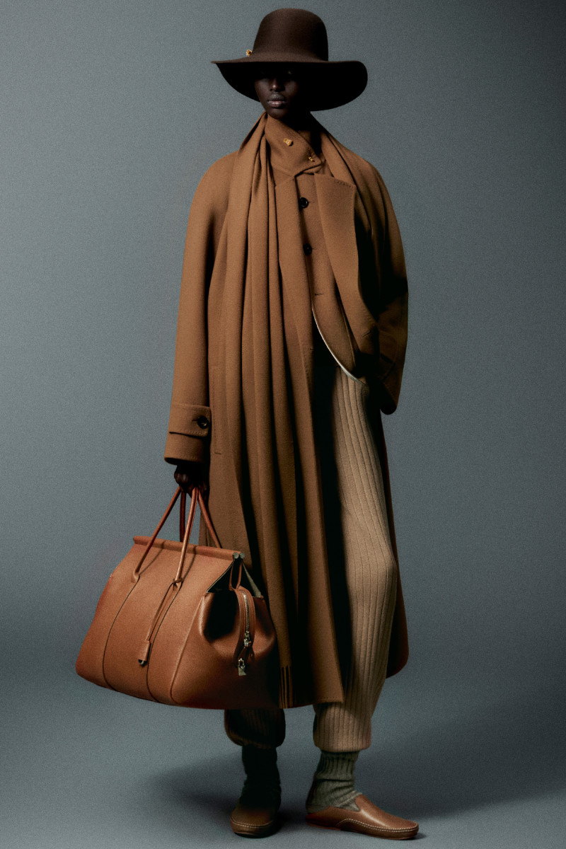 A woman wears an all-brown look from Loro Piana FW24