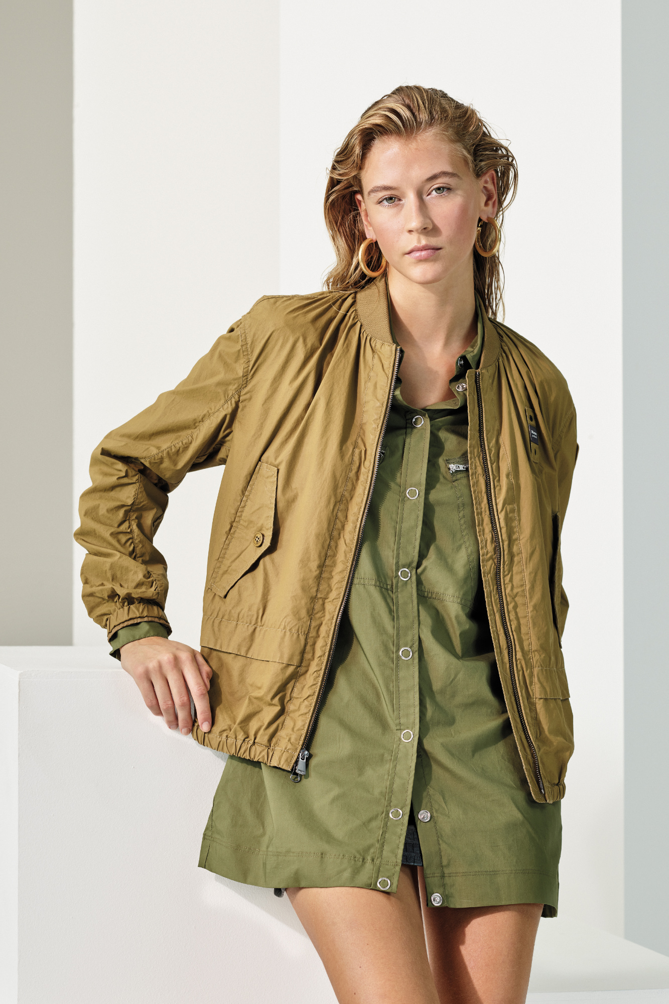 Female model wearing a khaki layering look from Blauer SS24
