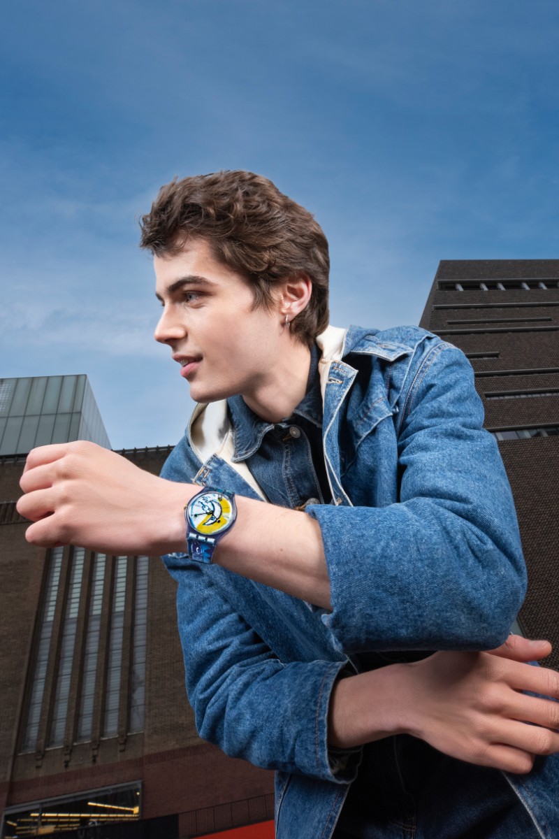 Man wearing a blue swatch and matching denim jacket