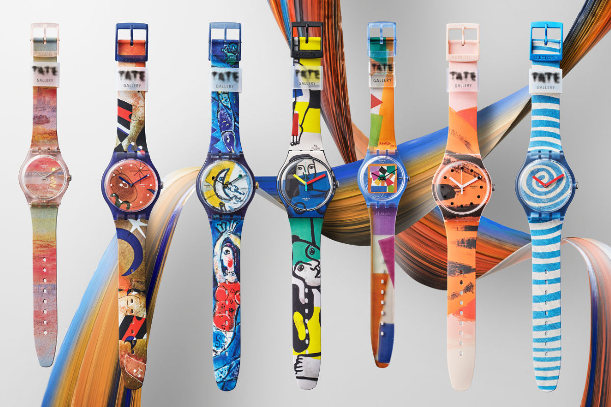 Seven artistically decorated watches positioned against a colourful background