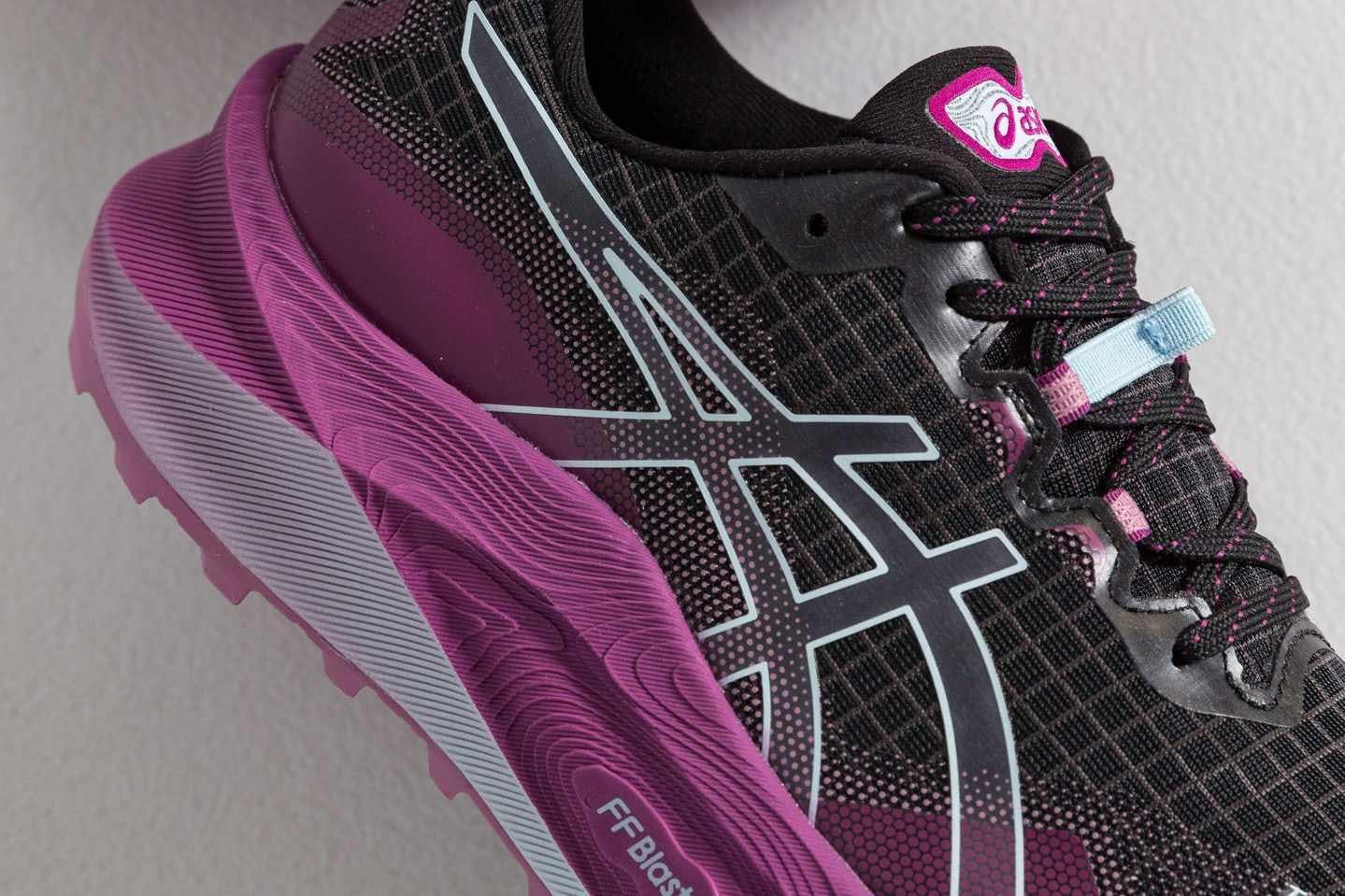 ASICS Trabuco Max 3 running sneaker in black and purple