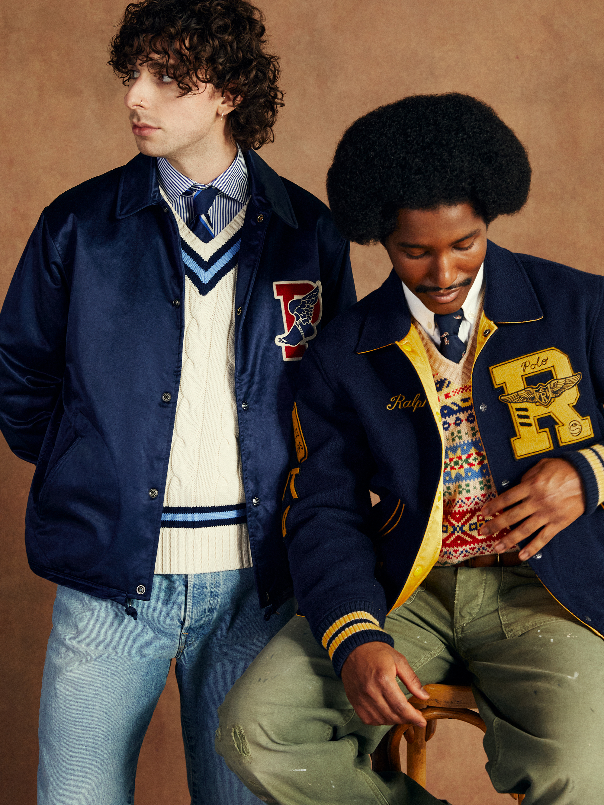 Two models pose together in classic varsity looks