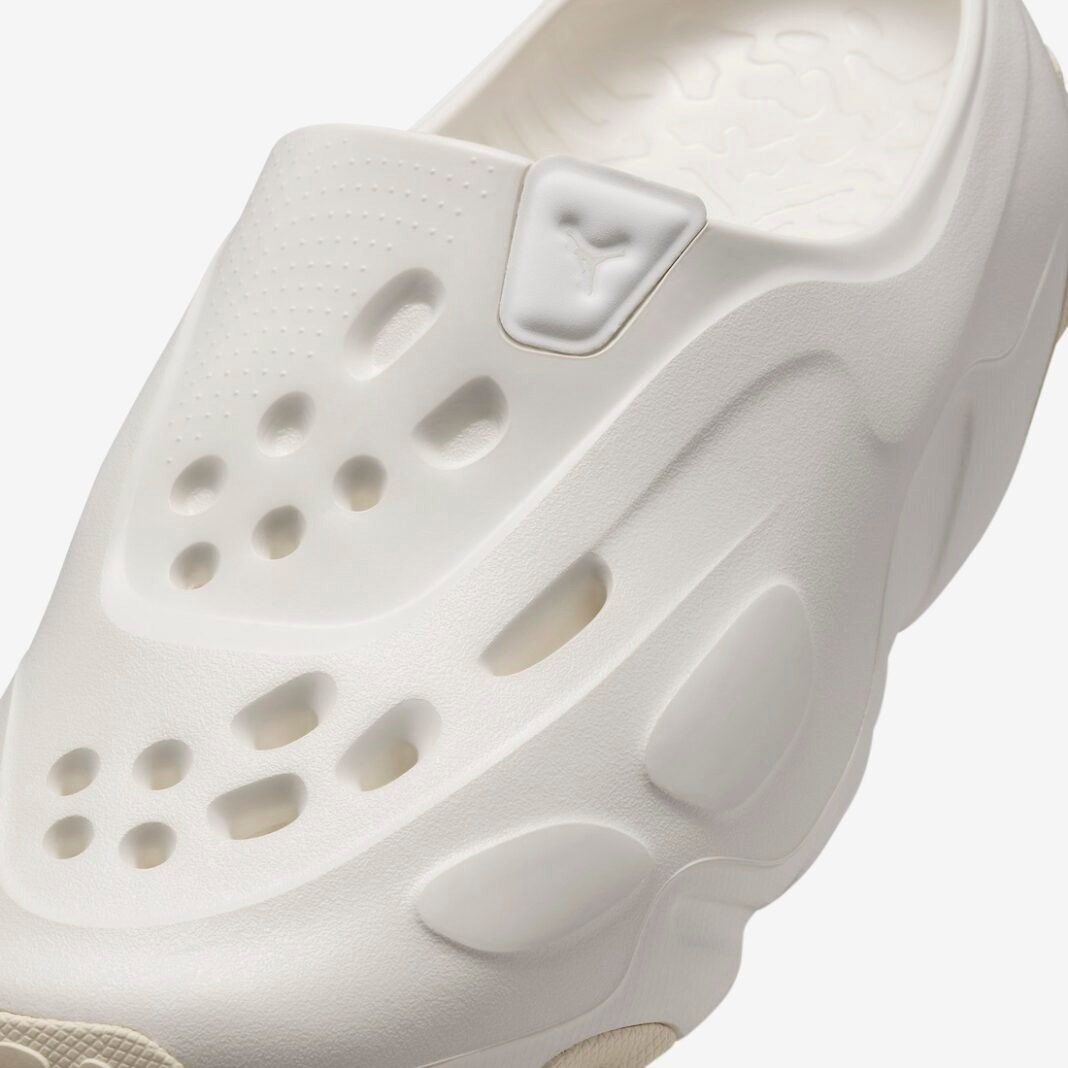 Jordan Brand's white Roam Clog made of foam with small holes and a sculpted footbed