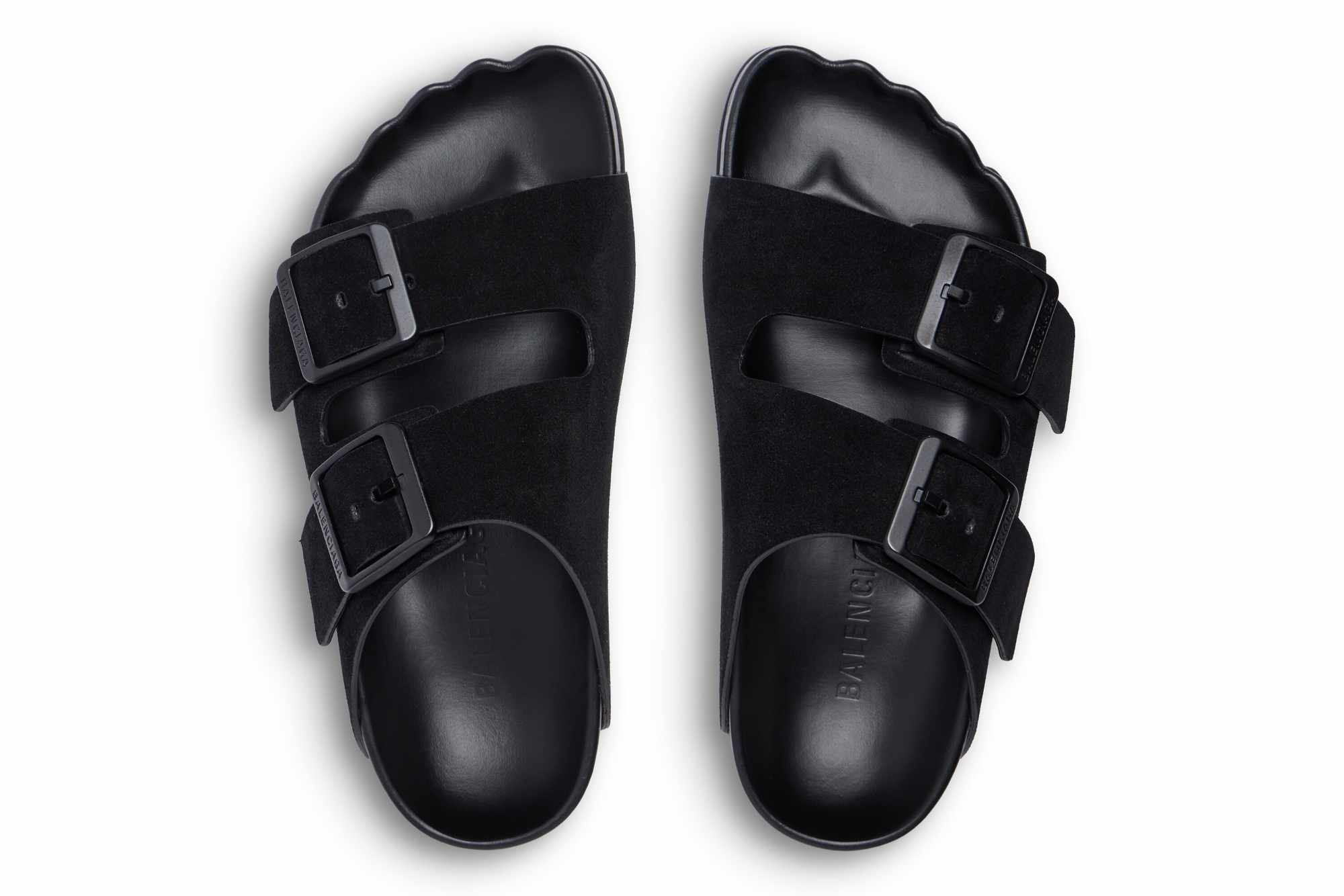 Balenciaga's Sunday Sandal in black suede, with two buckled straps and footbed