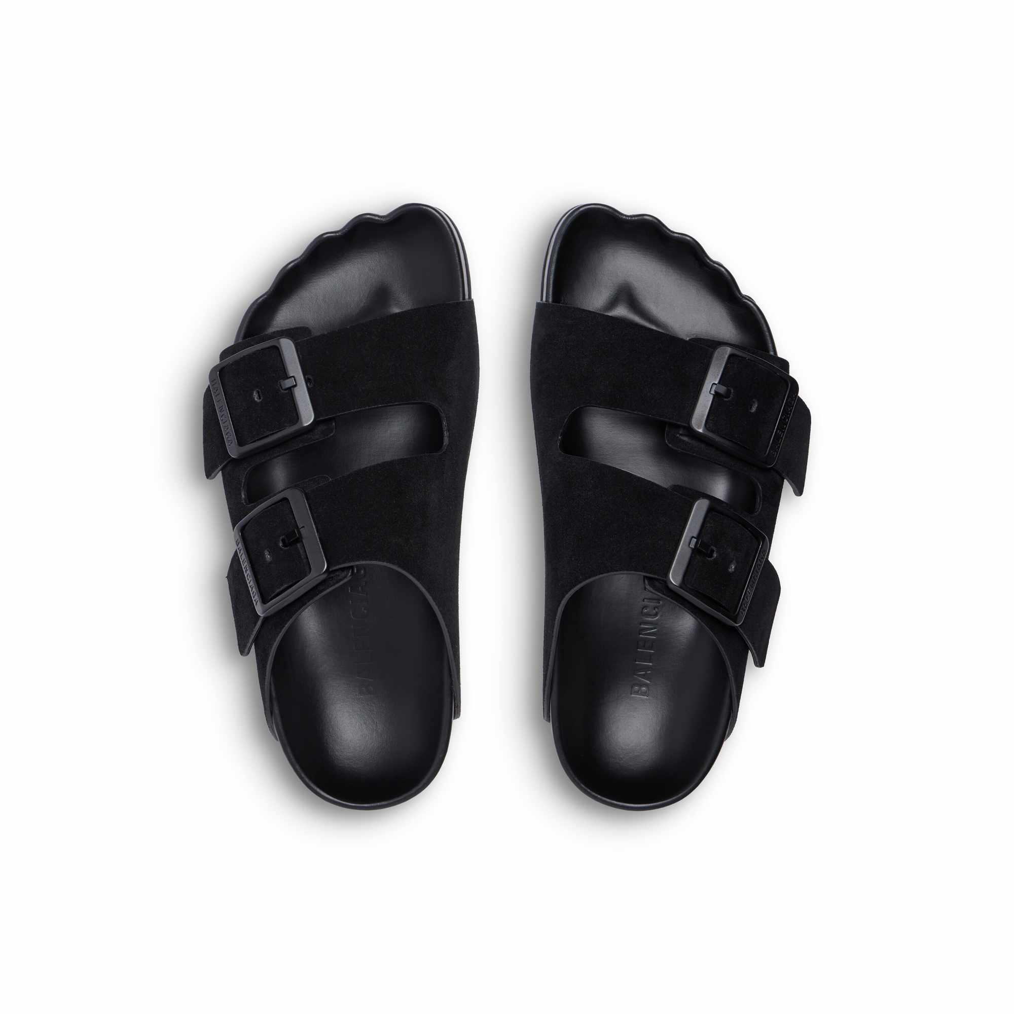 Balenciaga's Sunday Sandal in black suede, with two buckled straps and footbed