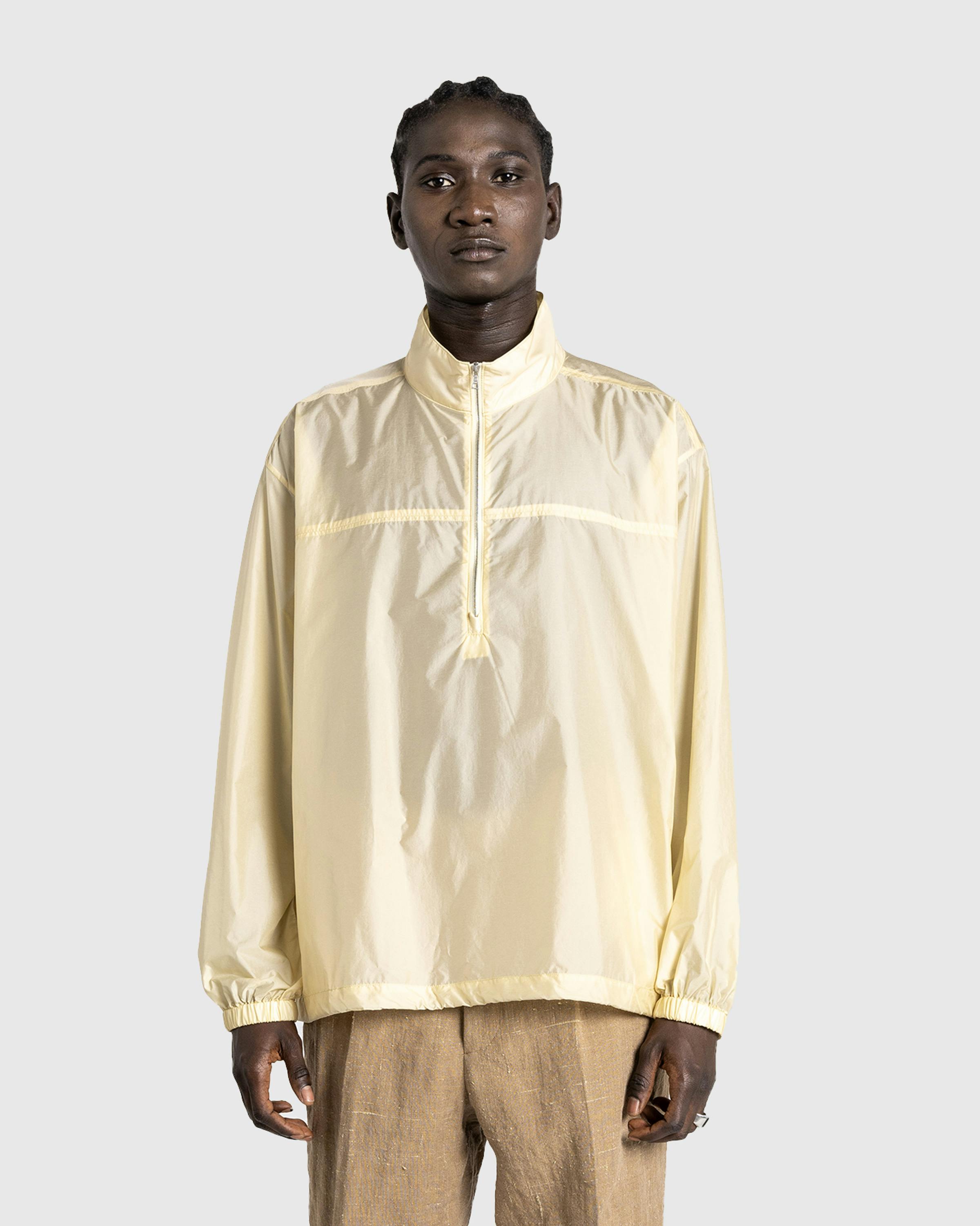 Auralee – Light Nylon Half Zip P/O Light Yellow | Highsnobiety Shop