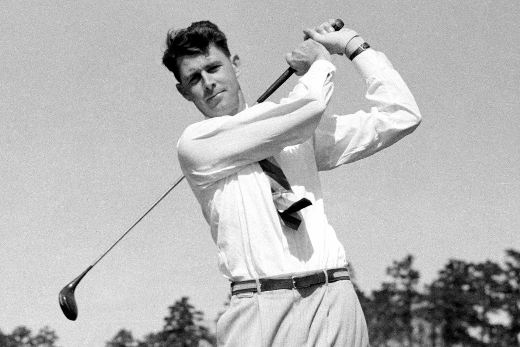 Horton Smith swings a golf club at the 1934 Augusta National golf tournament