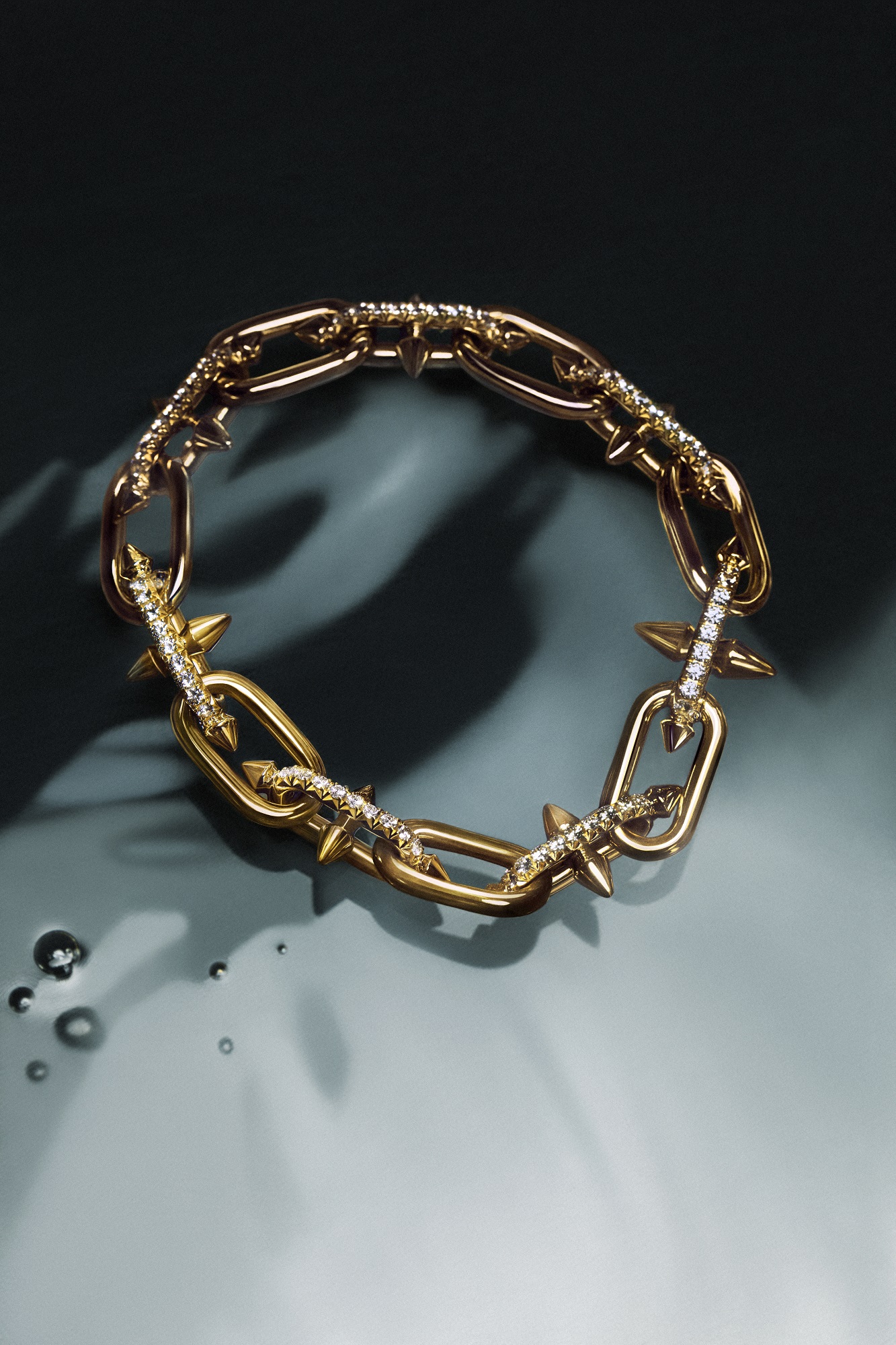 Pharrell & Tiffany's black titanium, gold, and diamond bracelet