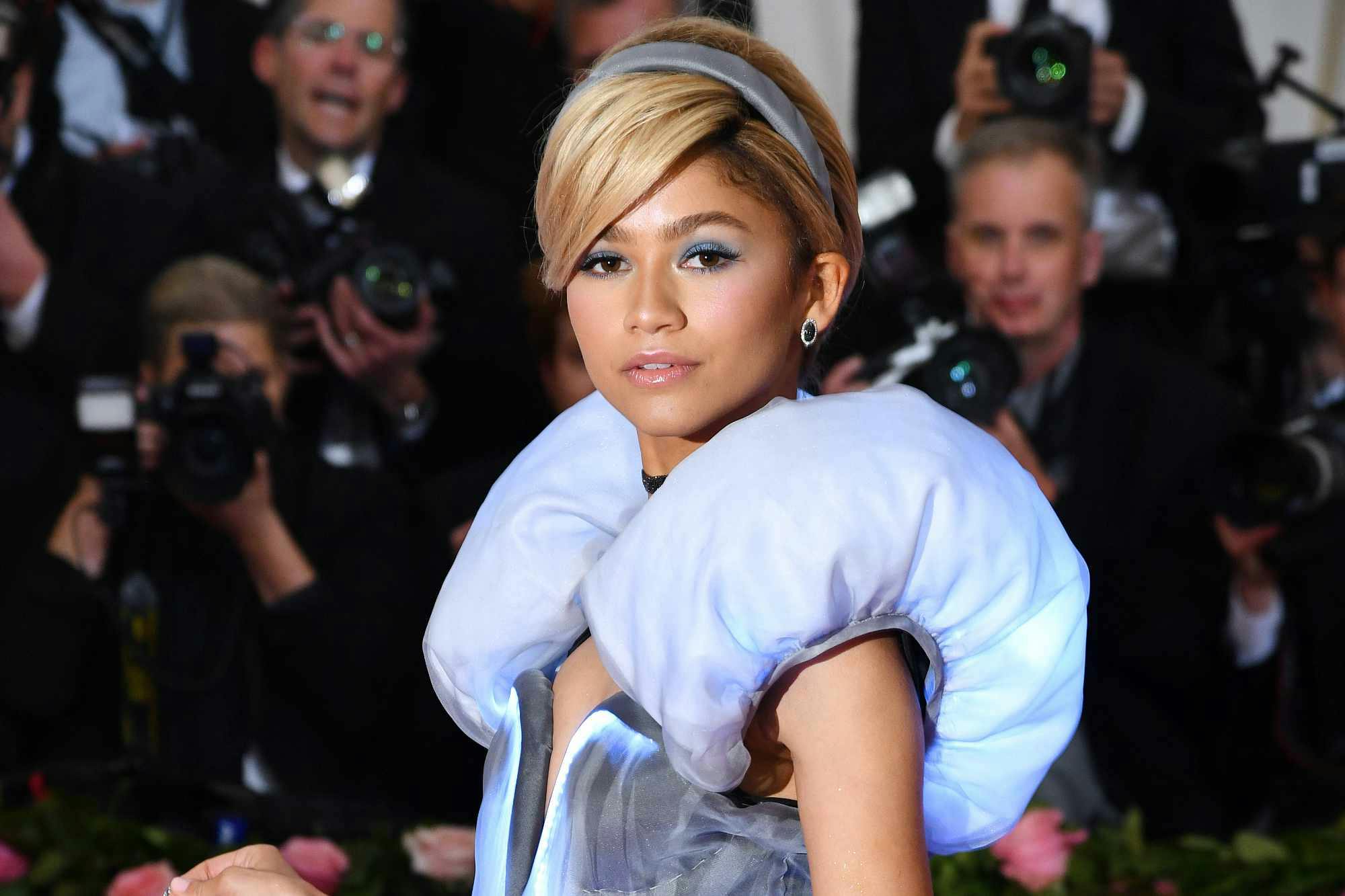 Zendaya walks the red carpet in a pink dress on the Met Gala red carpet