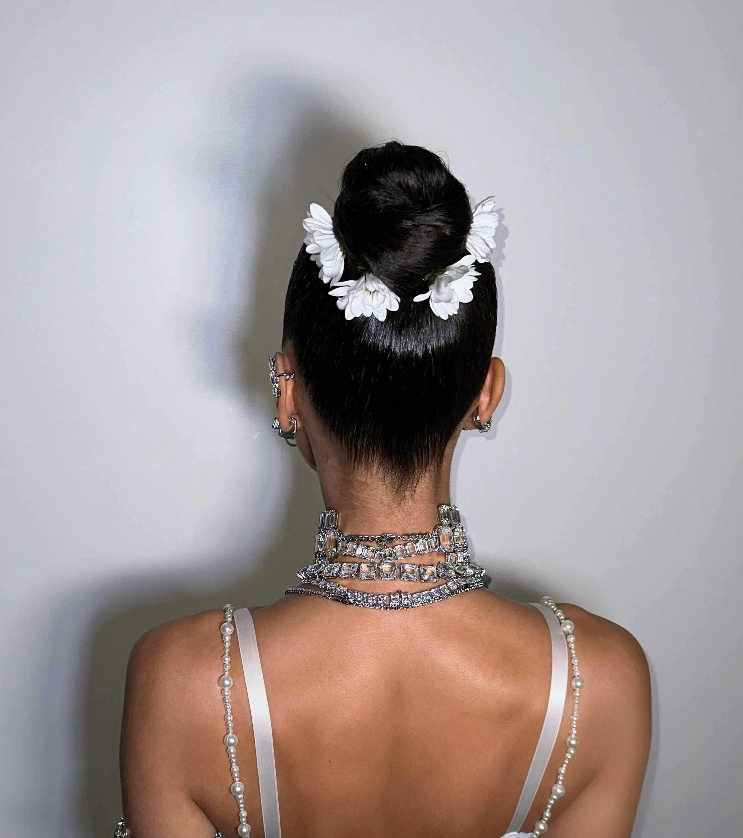 Irina Shayk wears a vintage gown customized by Swarovski at Met Gala 2024