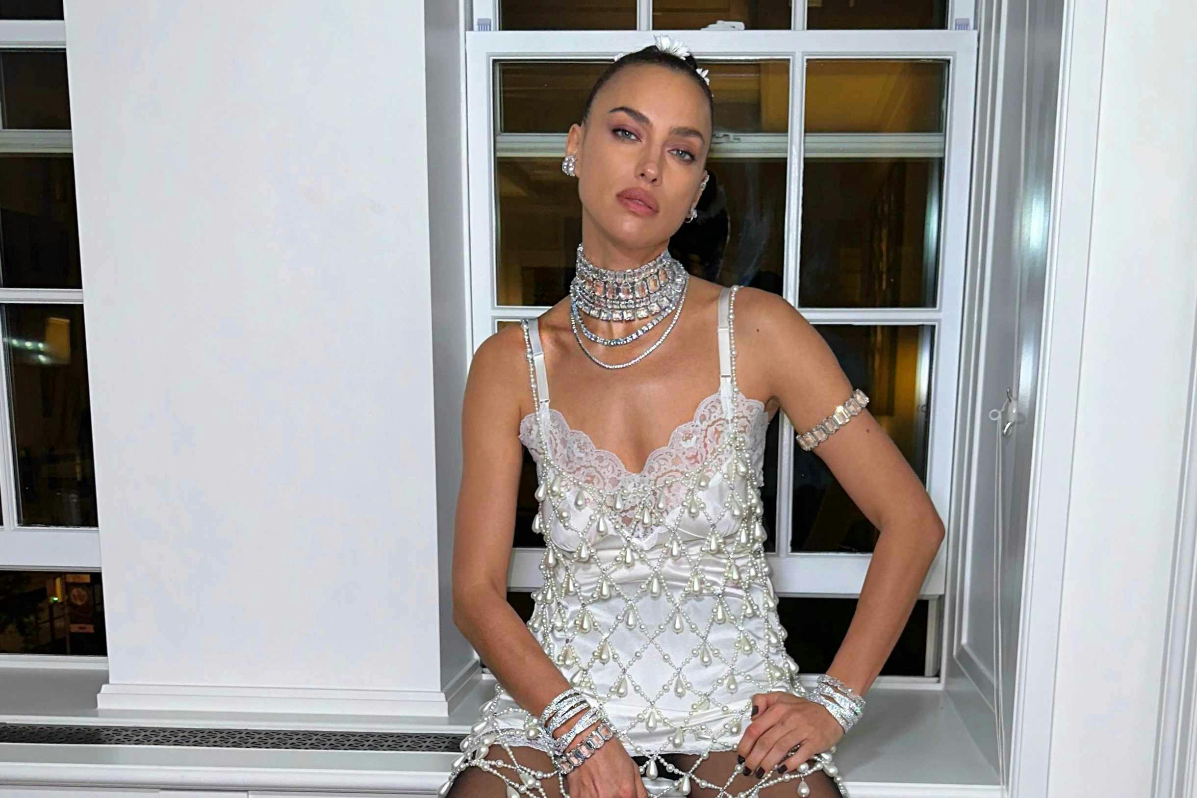 Irina Shayk wears a vintage gown customized by Swarovski at Met Gala 2024