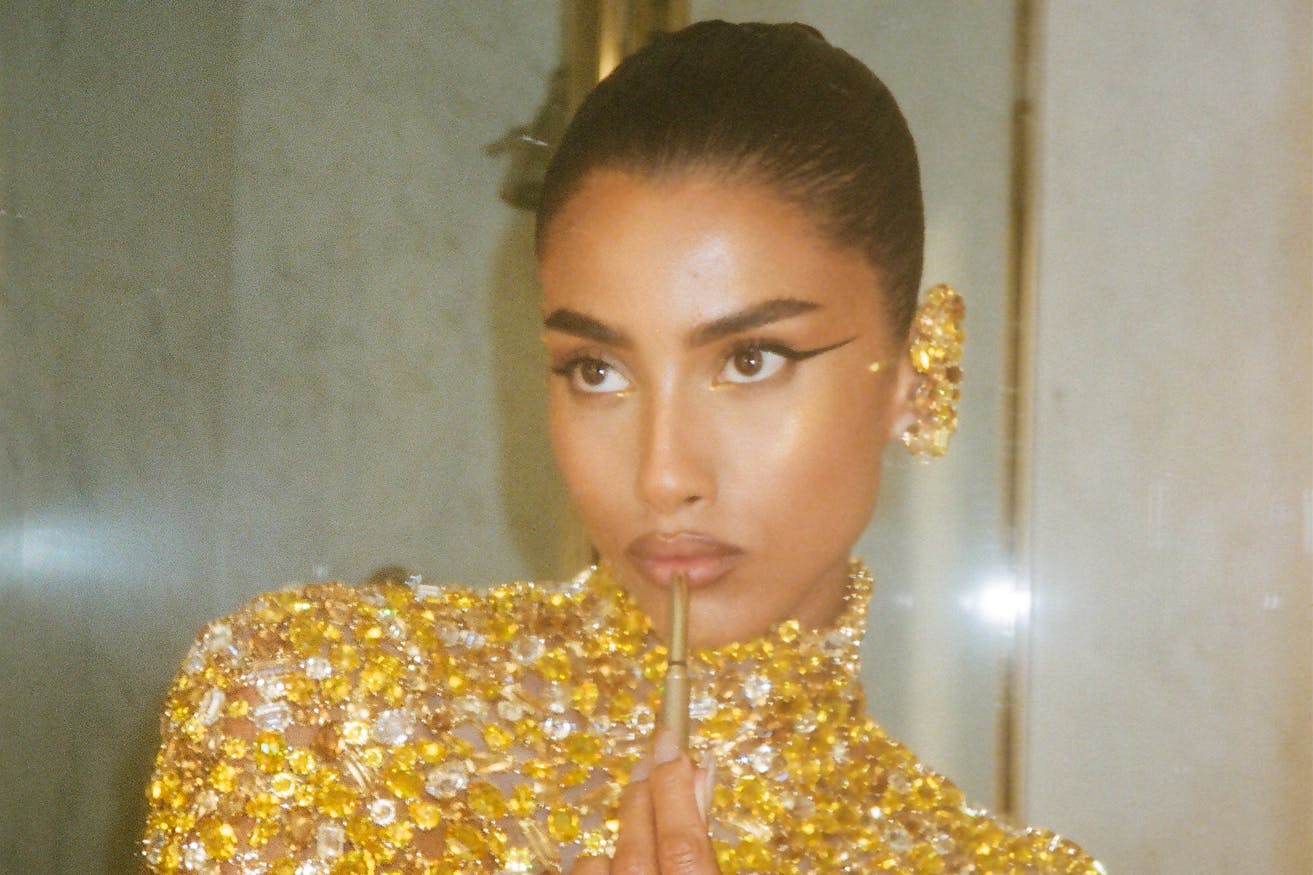 Imaan Hammam wears gold Swarovski crystals at the 2024 Met Gala