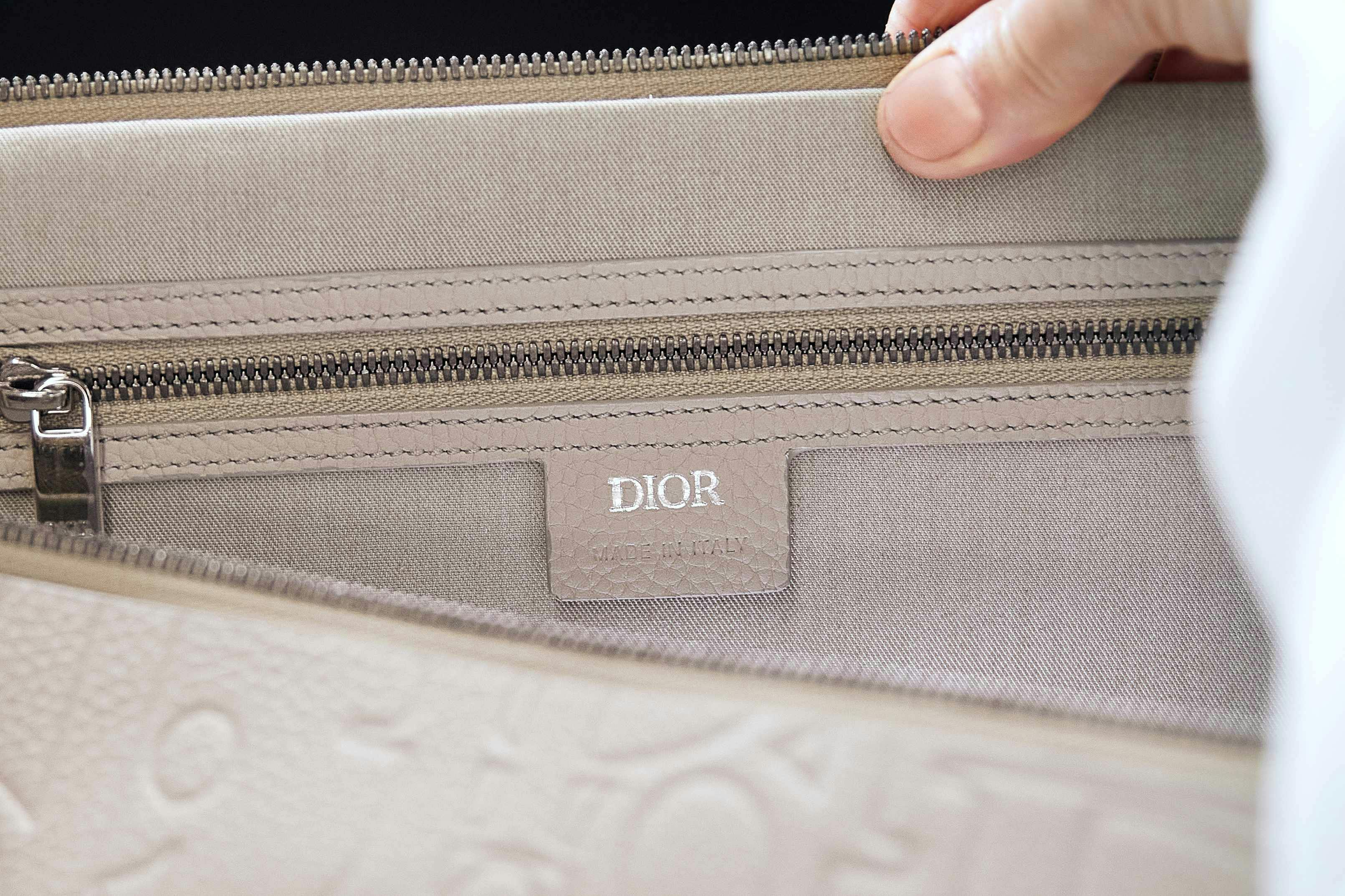 Dior's leather Gravity bags in beige and black made at an Italian factory