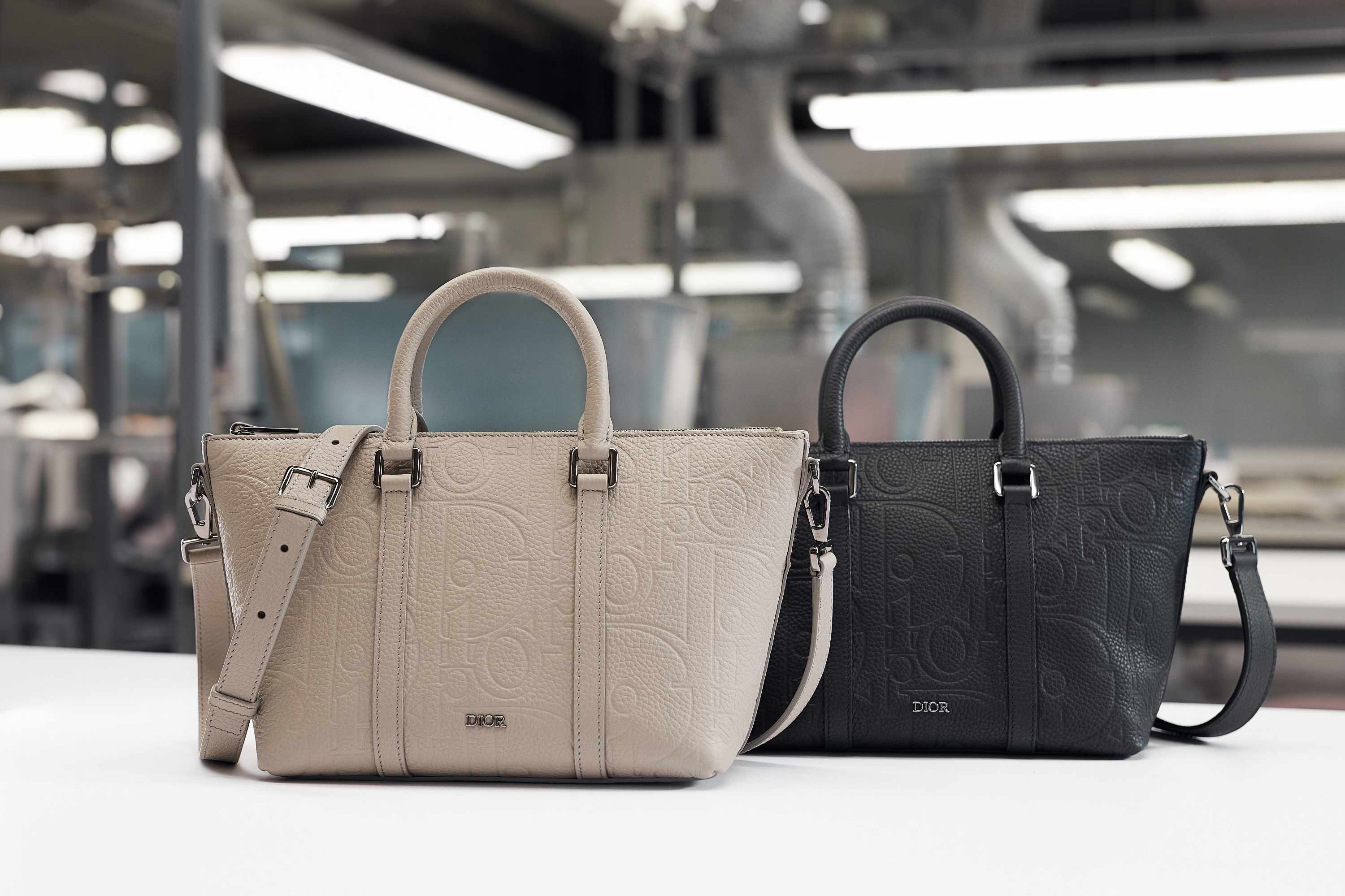 Dior's leather Gravity bags in beige and black made at an Italian factory
