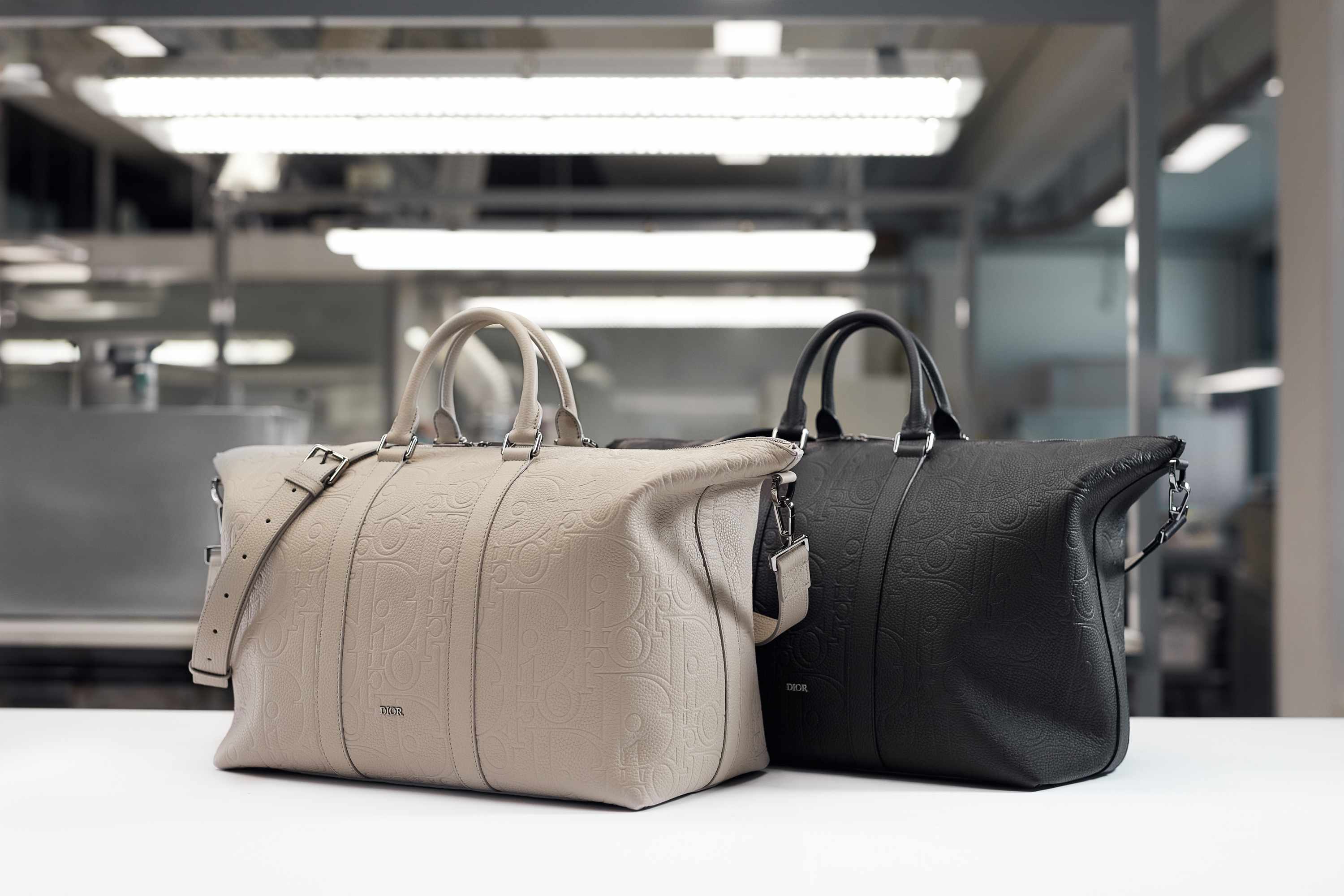 Dior's leather Gravity bags in beige and black made at an Italian factory
