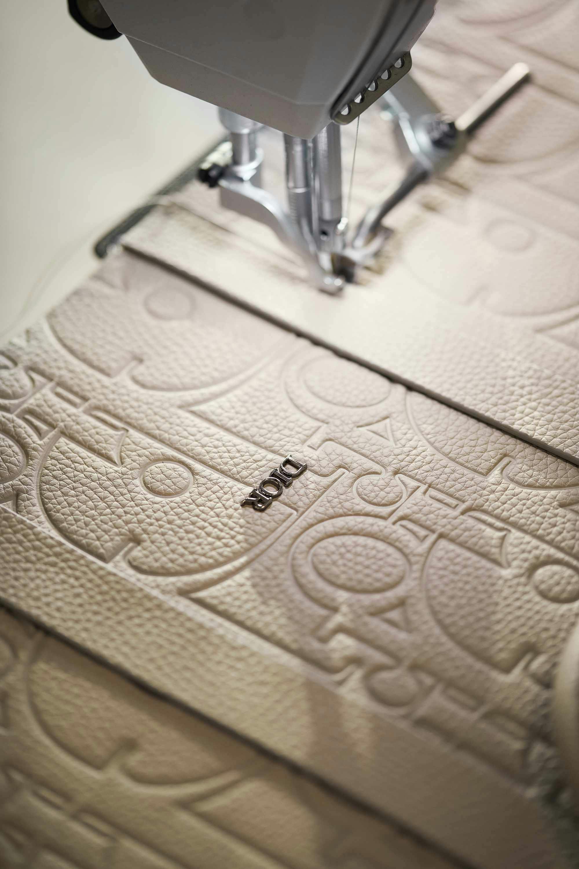 Dior's leather Gravity bags in beige and black made at an Italian factory