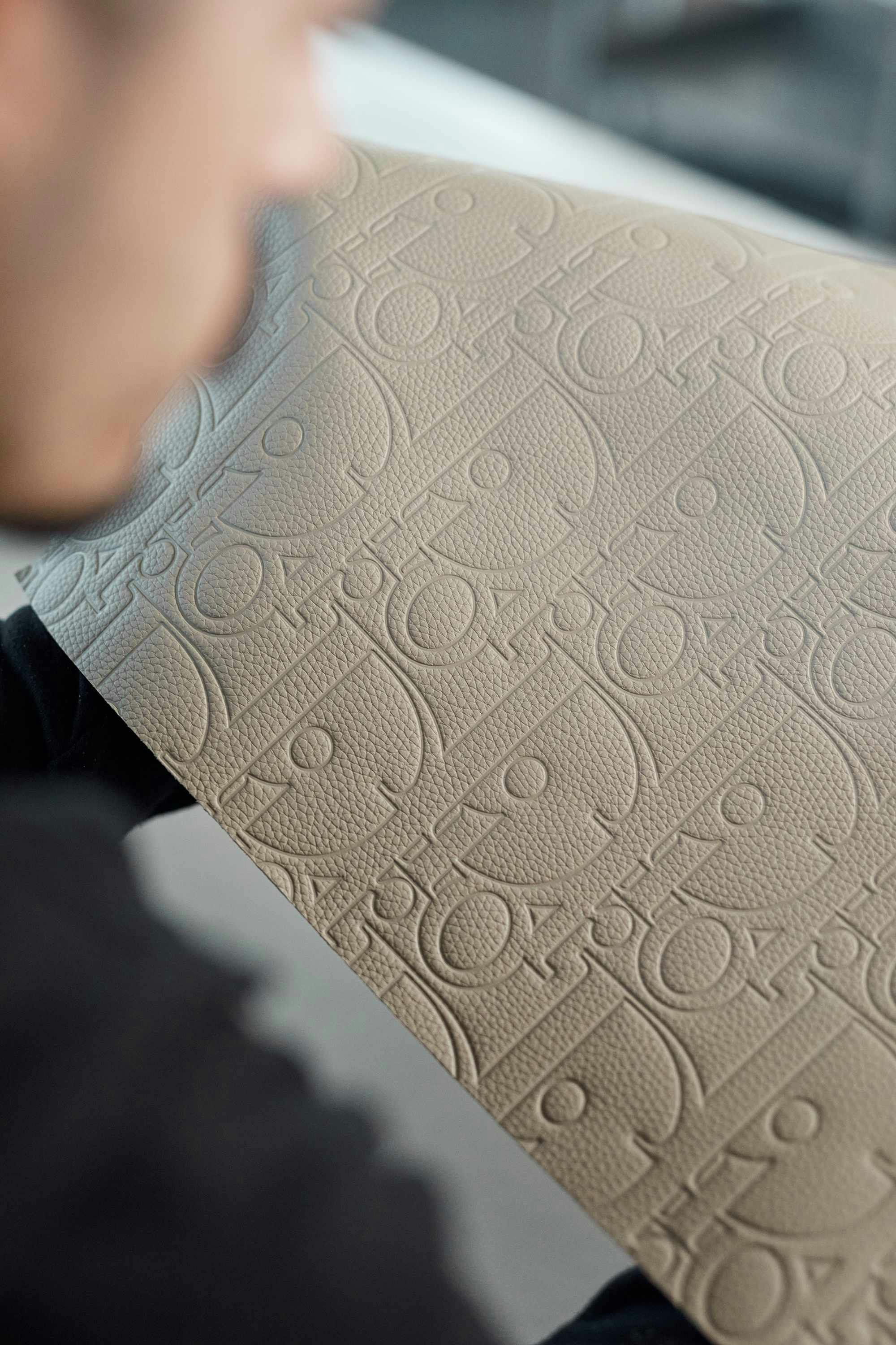 Dior's leather Gravity bags in beige and black made at an Italian factory